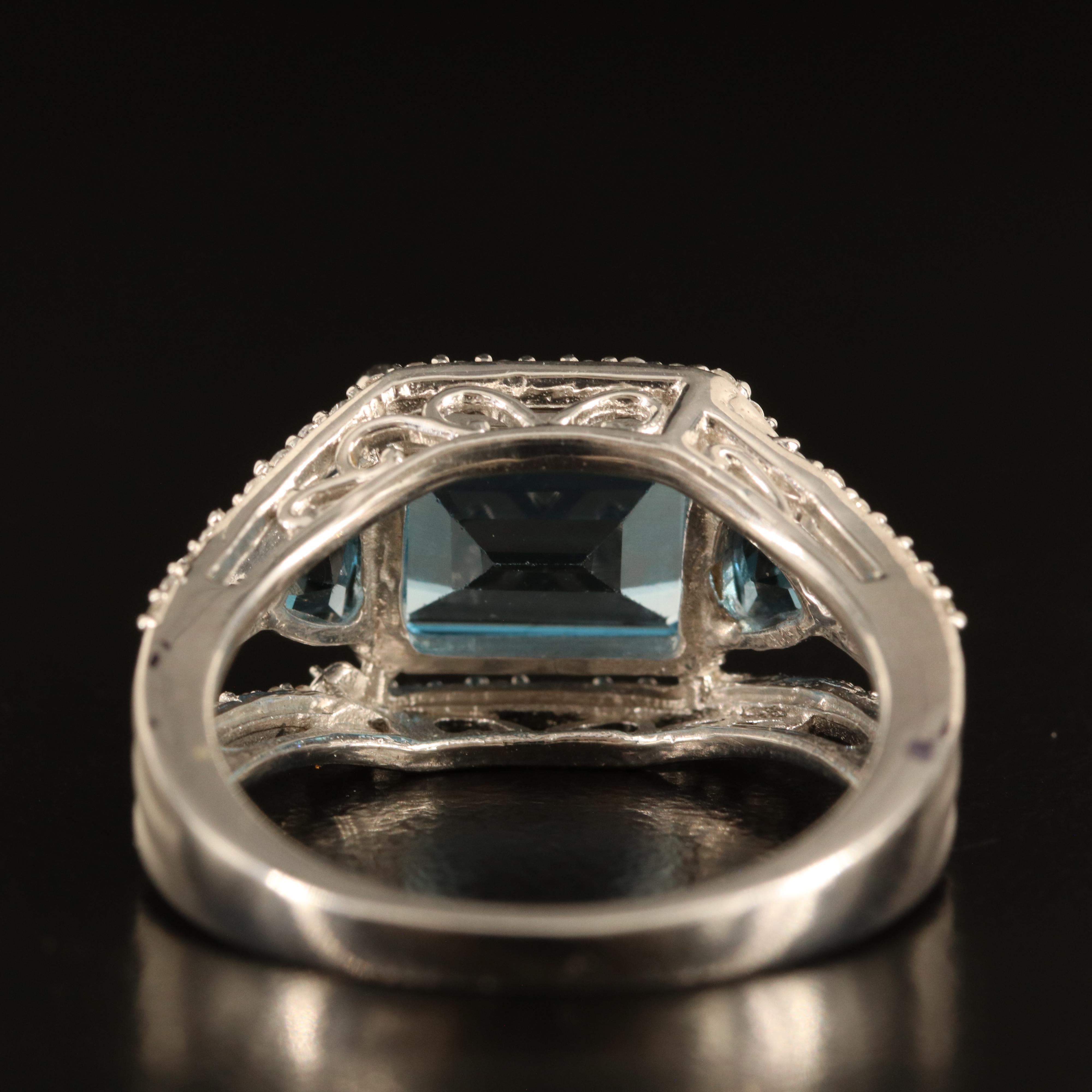 Sterling Swiss and London Blue Topaz Ring with White Sapphire Border