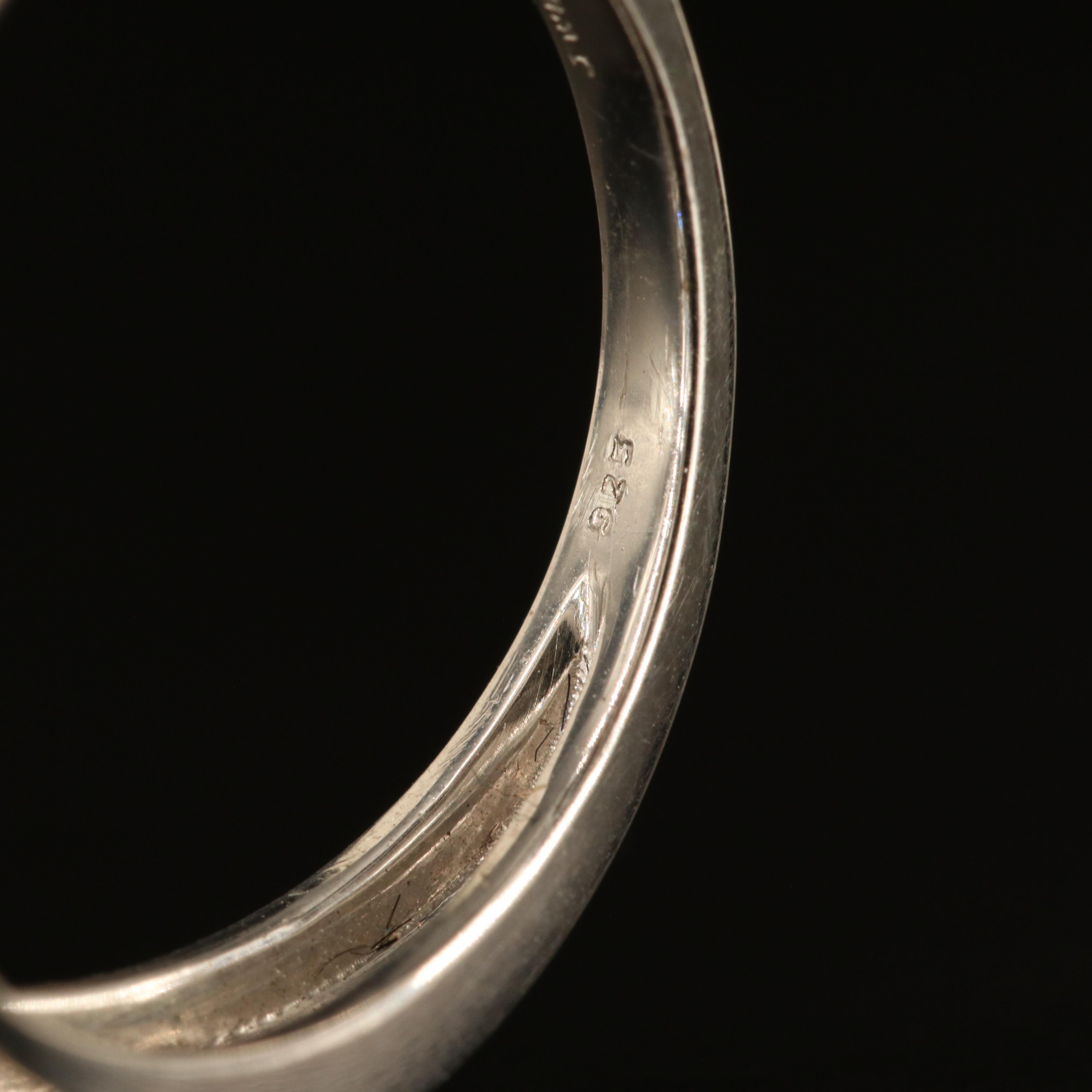 Sterling Swiss and London Blue Topaz Ring with White Sapphire Border