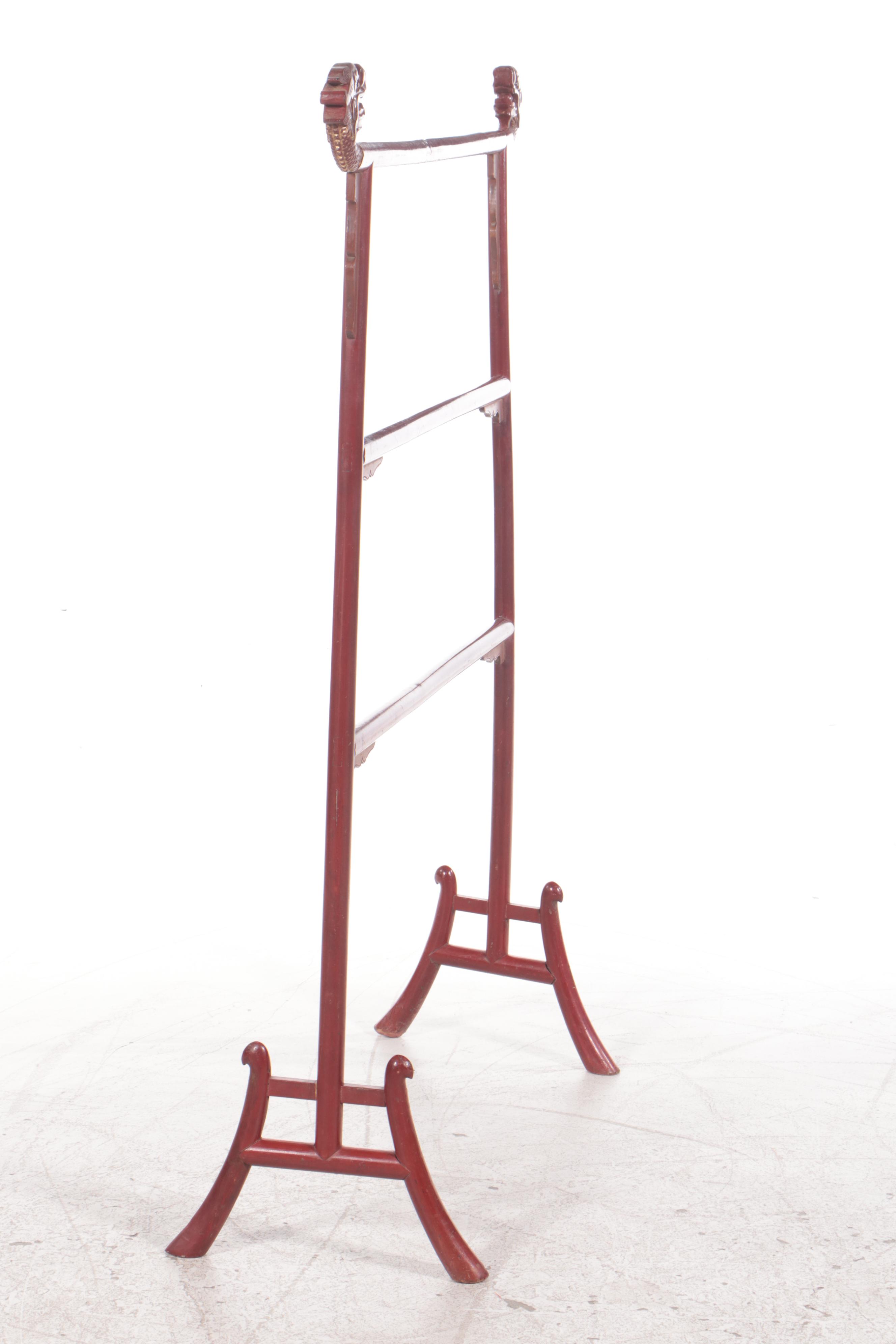 Chinese Red and Gilt-Lacquered Clothes Rack with Dragon's Head Terminals