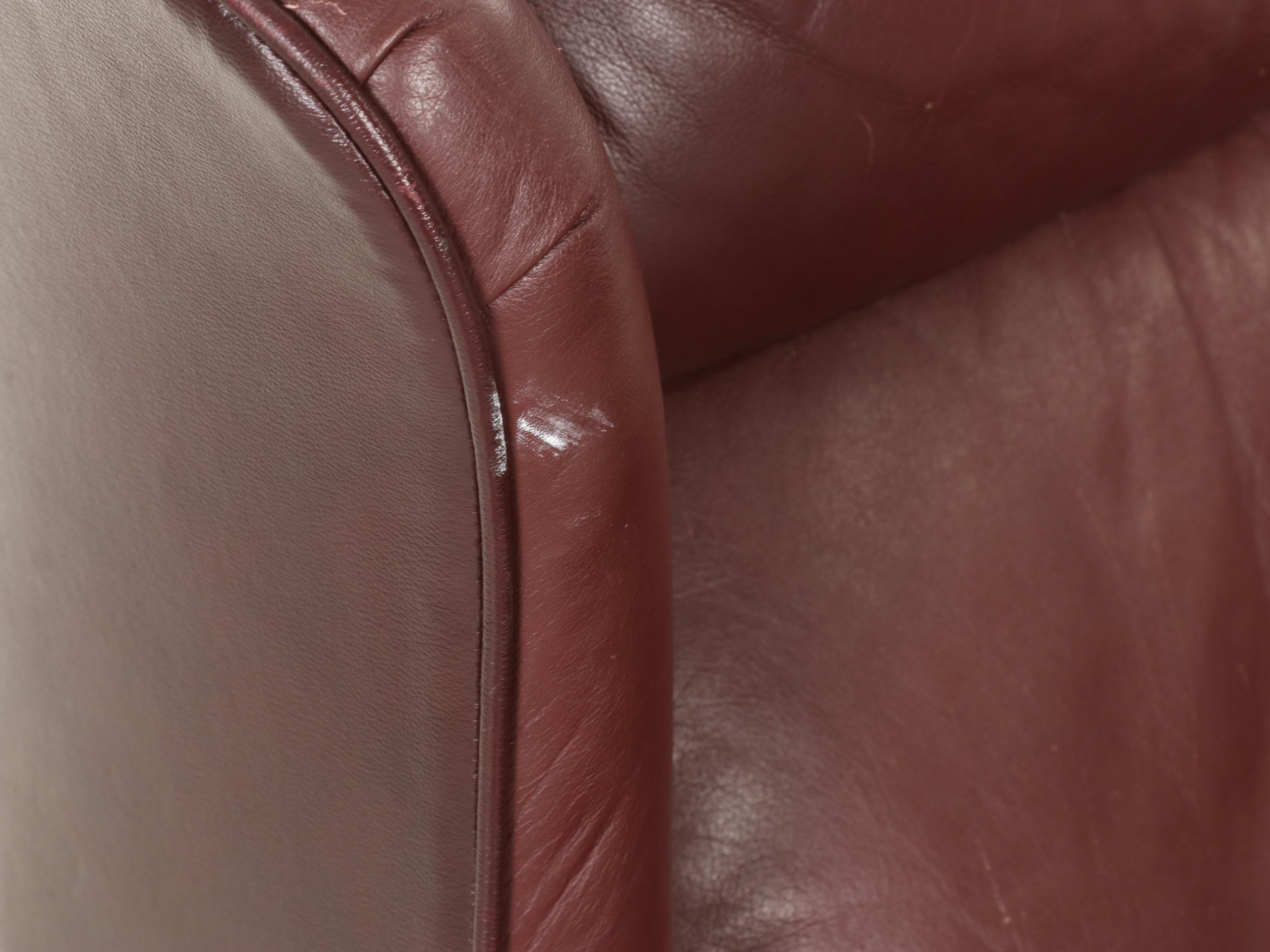 Faux Leather and Brass-Tacked Reclining Wingback Armchair with Side Table