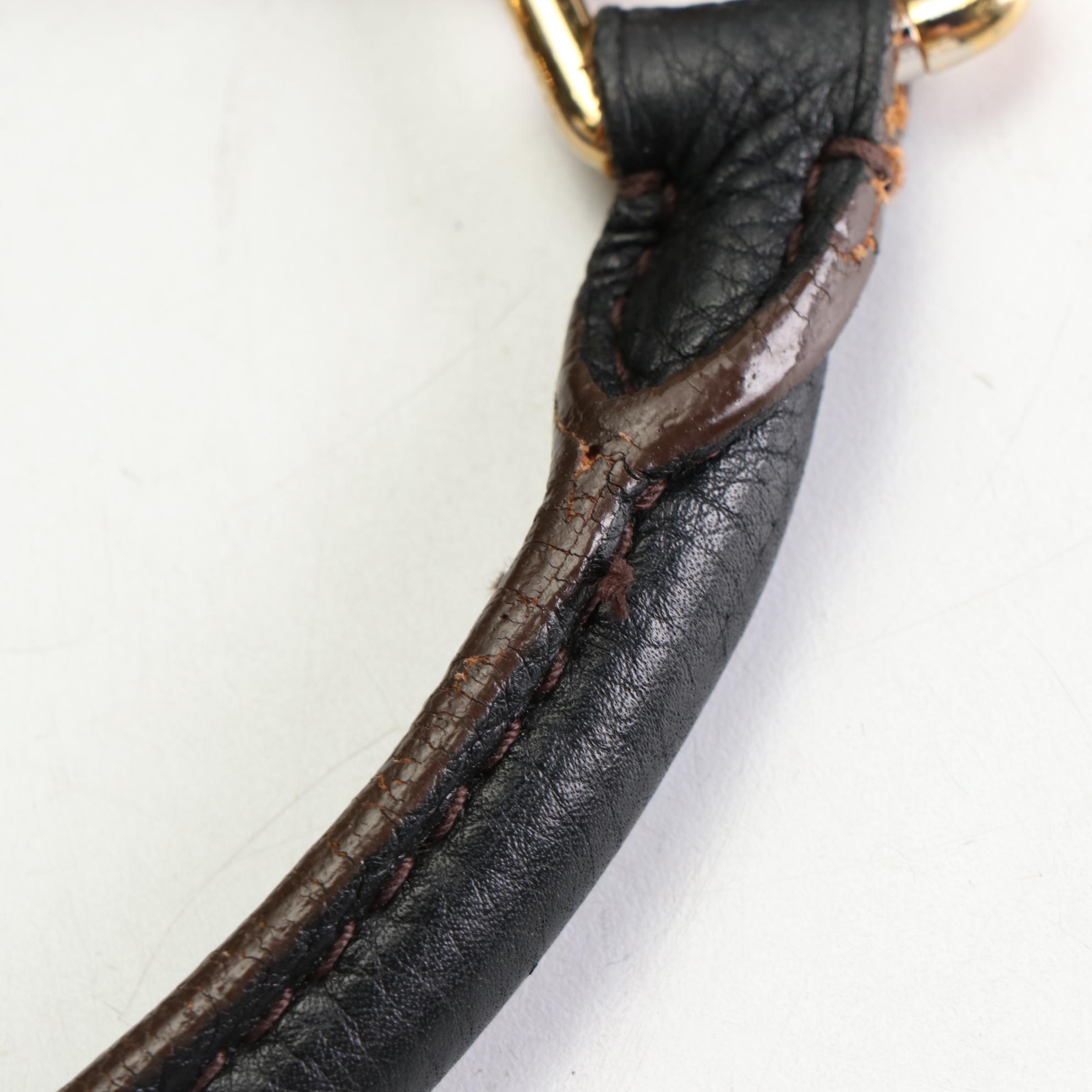 Louis Vuitton L Hobo Tote in Mahina Leather