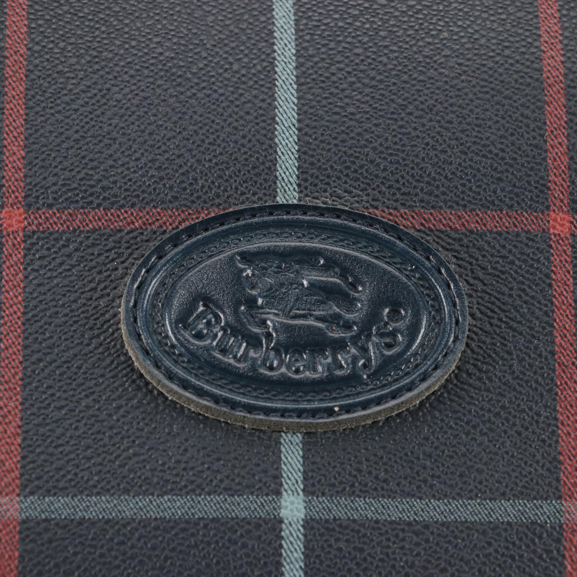 Burberrys Duffel Bag in Plaid Coated Canvas and Leather