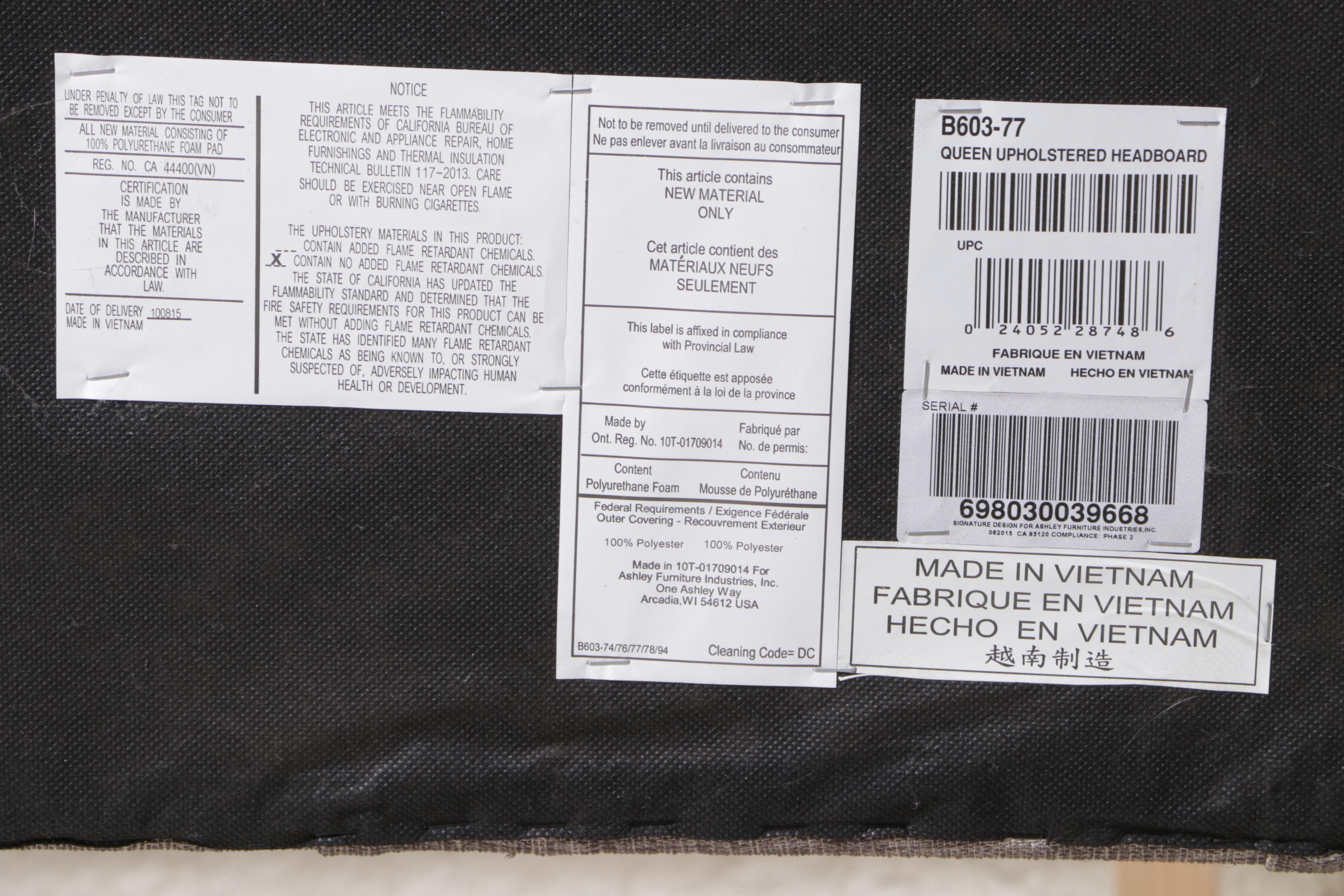 Ashley Furniture Upholstered and Buttoned-Down Queen Size Bed Frame