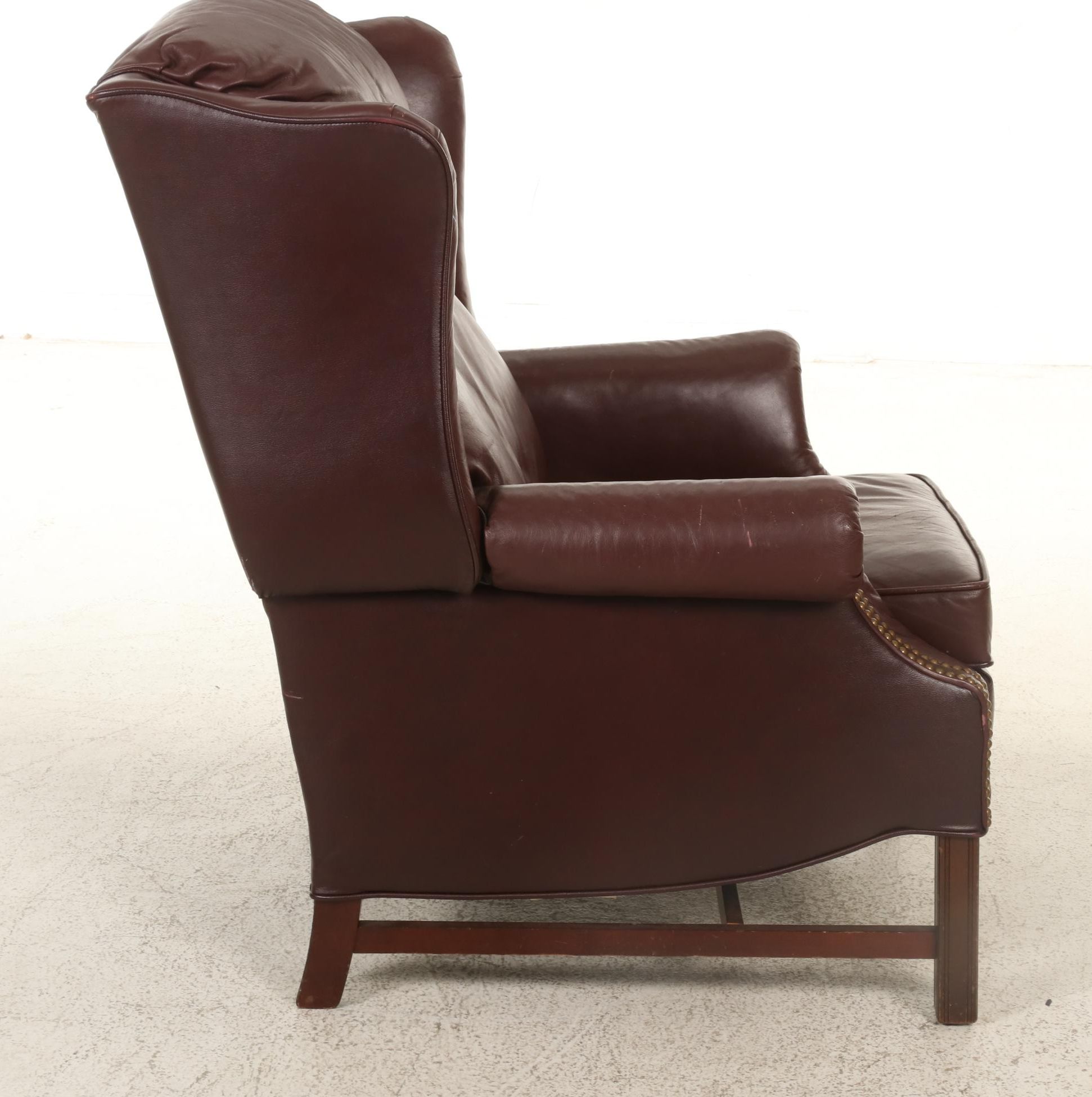 Faux Leather and Brass-Tacked Reclining Wingback Armchair with Side Table