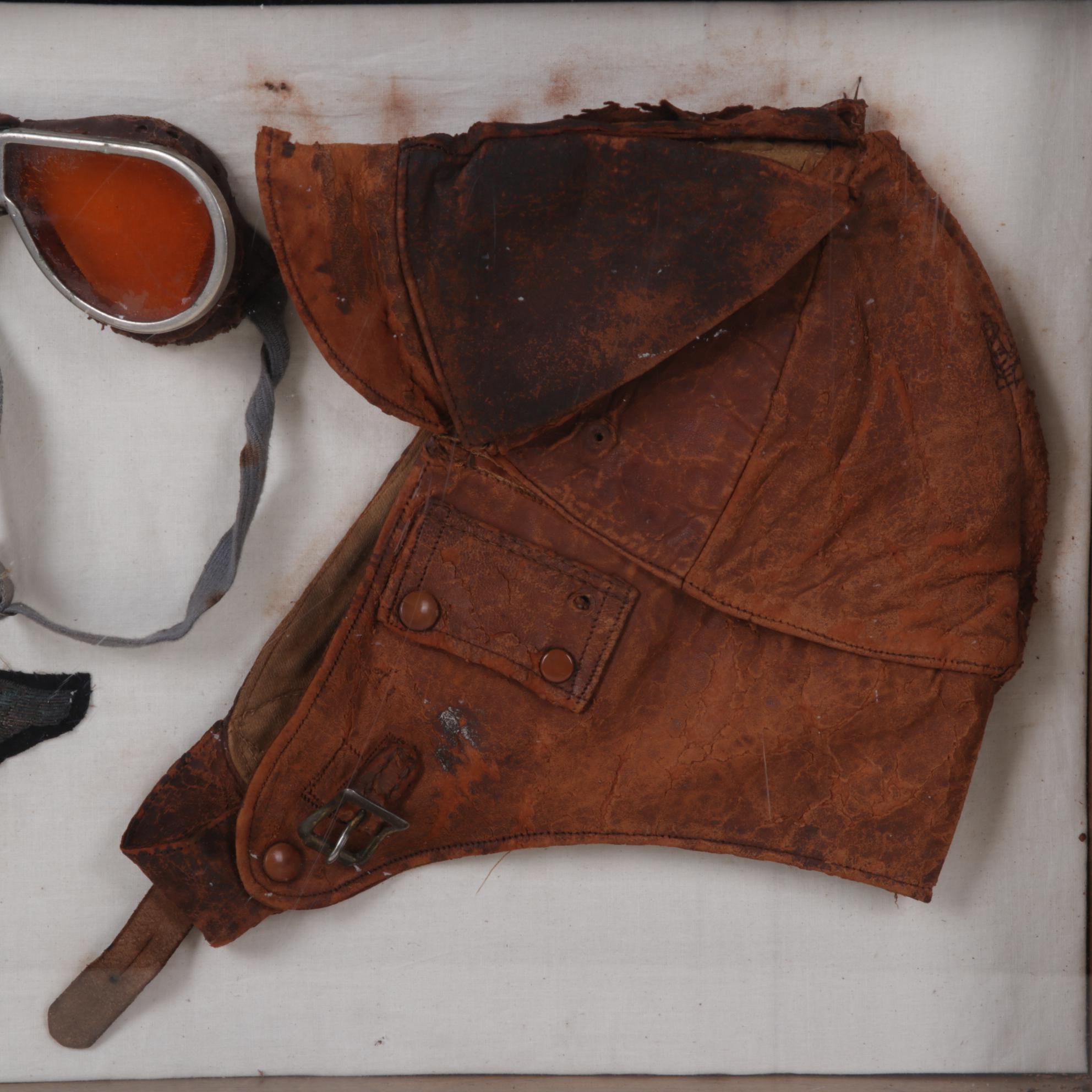 Aviator Goggles, Leather Cap, and Insignia in Frame, Circa 1930
