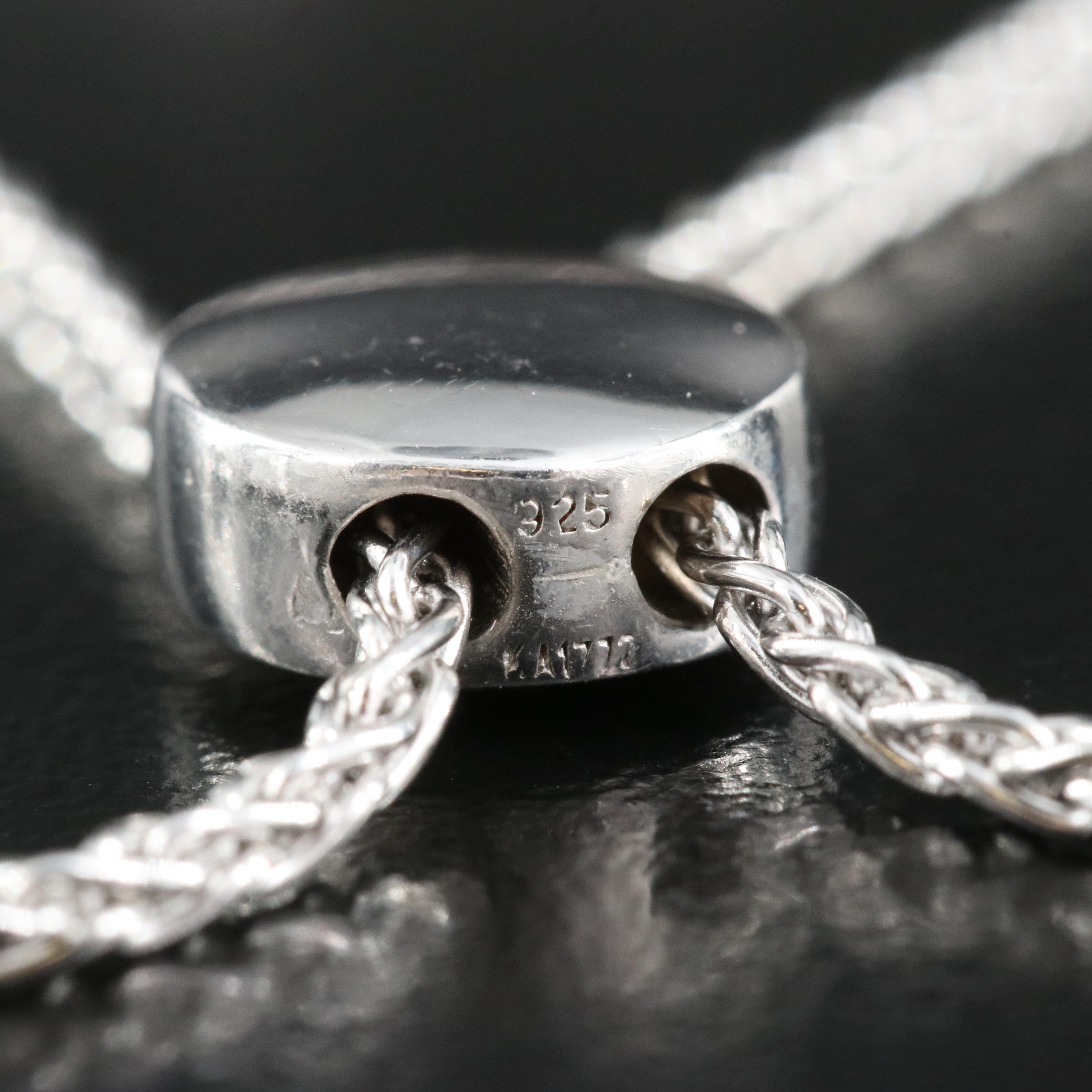 Sterling Garnet and Topaz Bolo Bracelet with 10K Rose Gold Accents