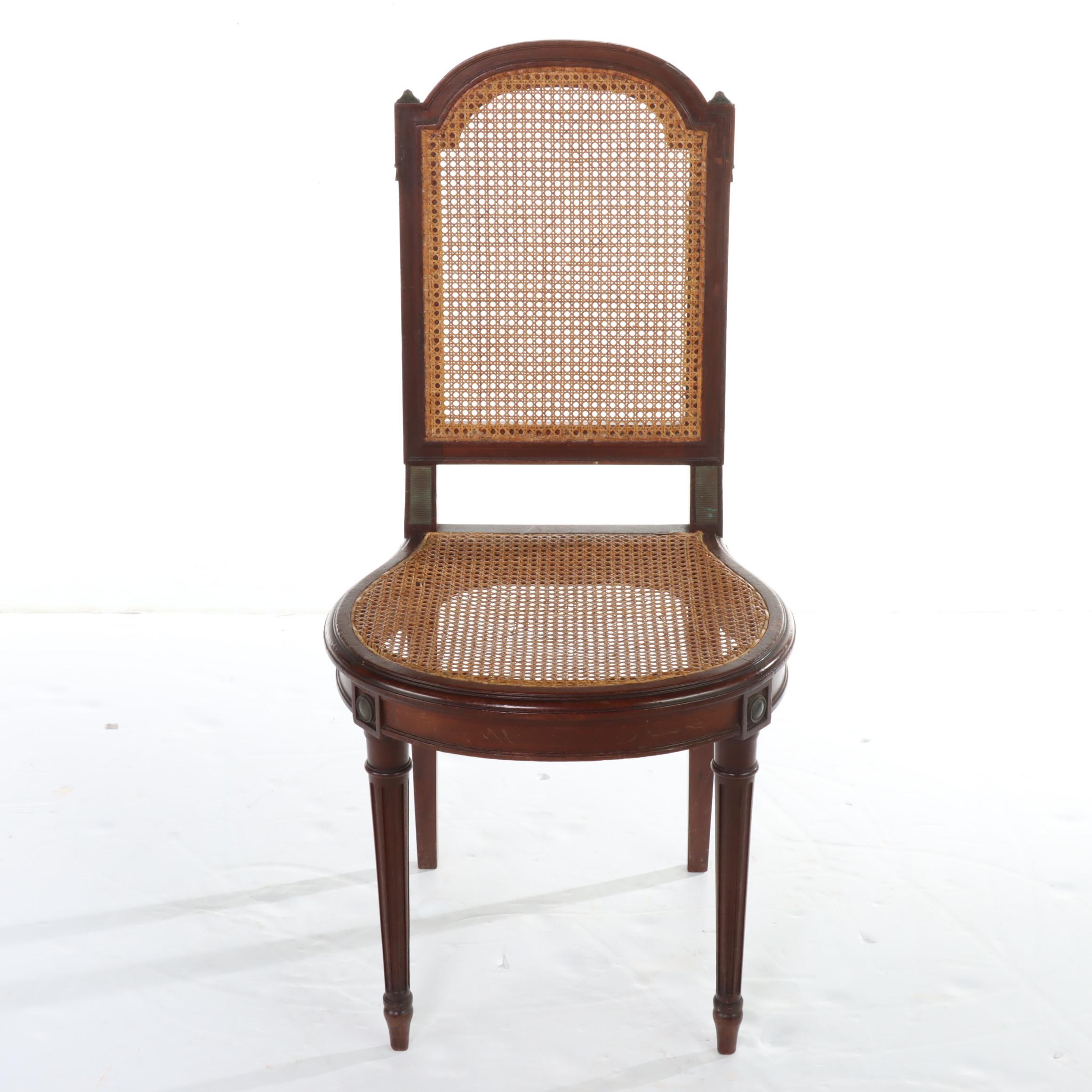 Pair of Louis XVI Style Gilt Metal-Mounted Walnut and Caned Salon Chairs