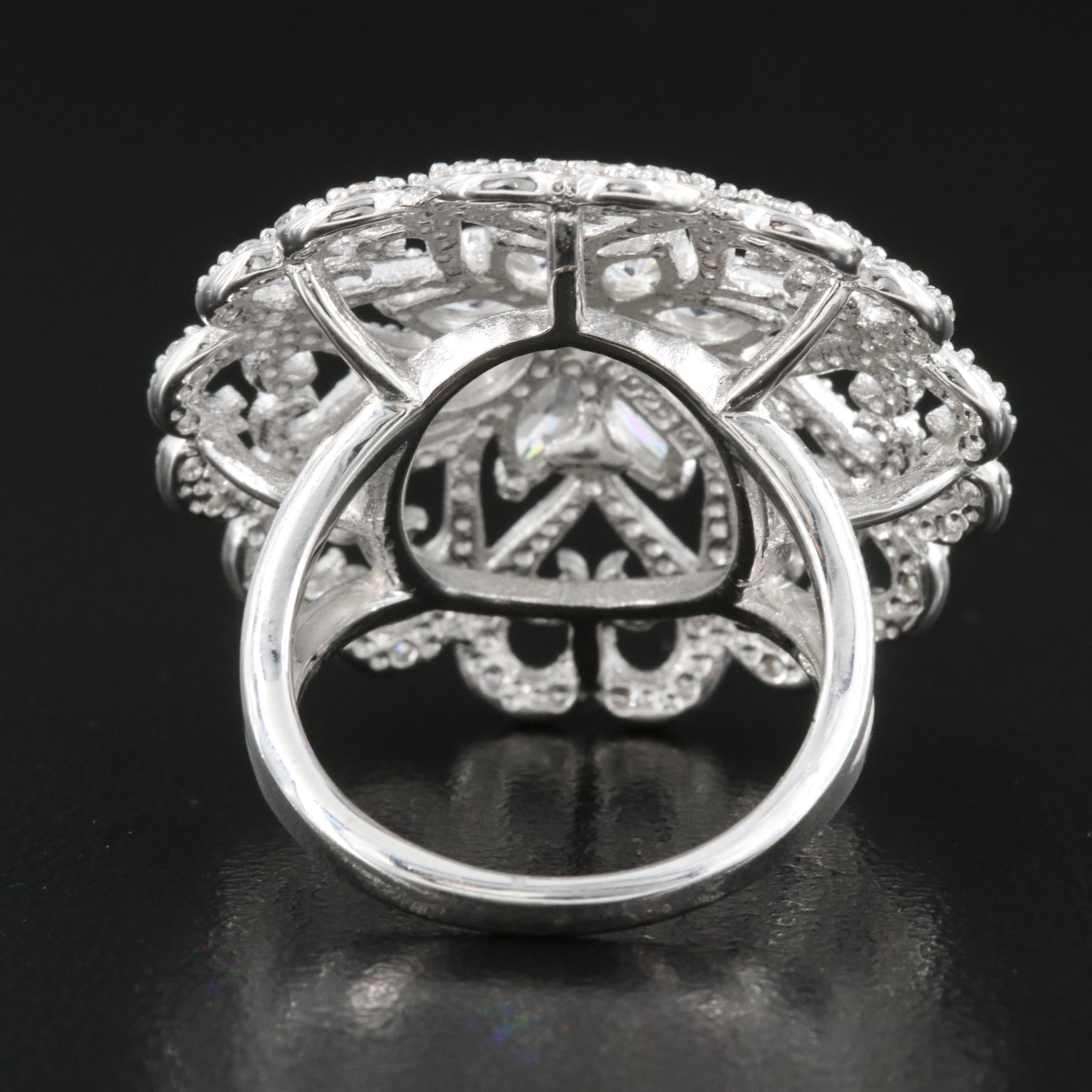 Sterling Cubic Zirconia Ring with Heart Detail