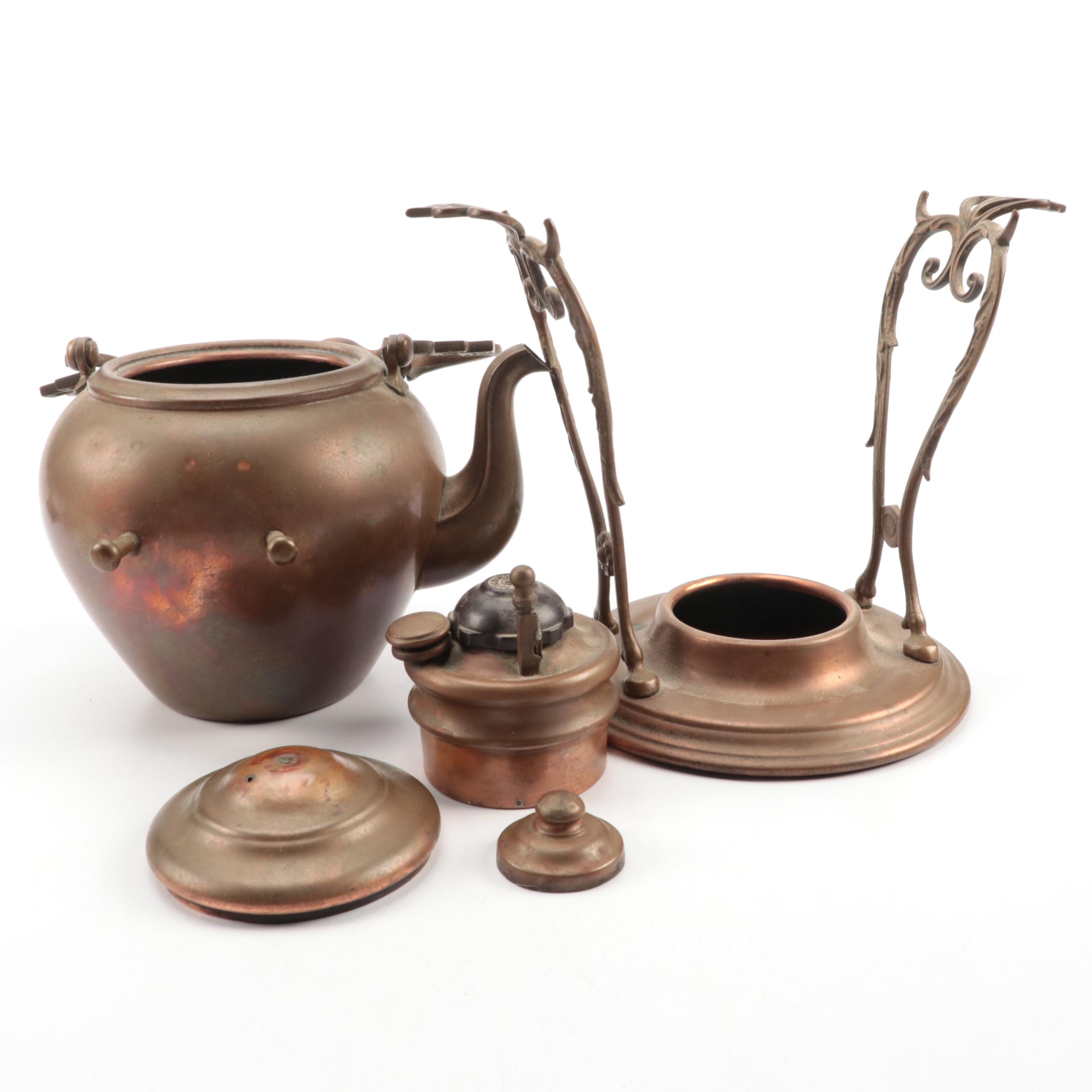 Copper Tilting Teapot with Burner and Ballister Form Brass Candlesticks