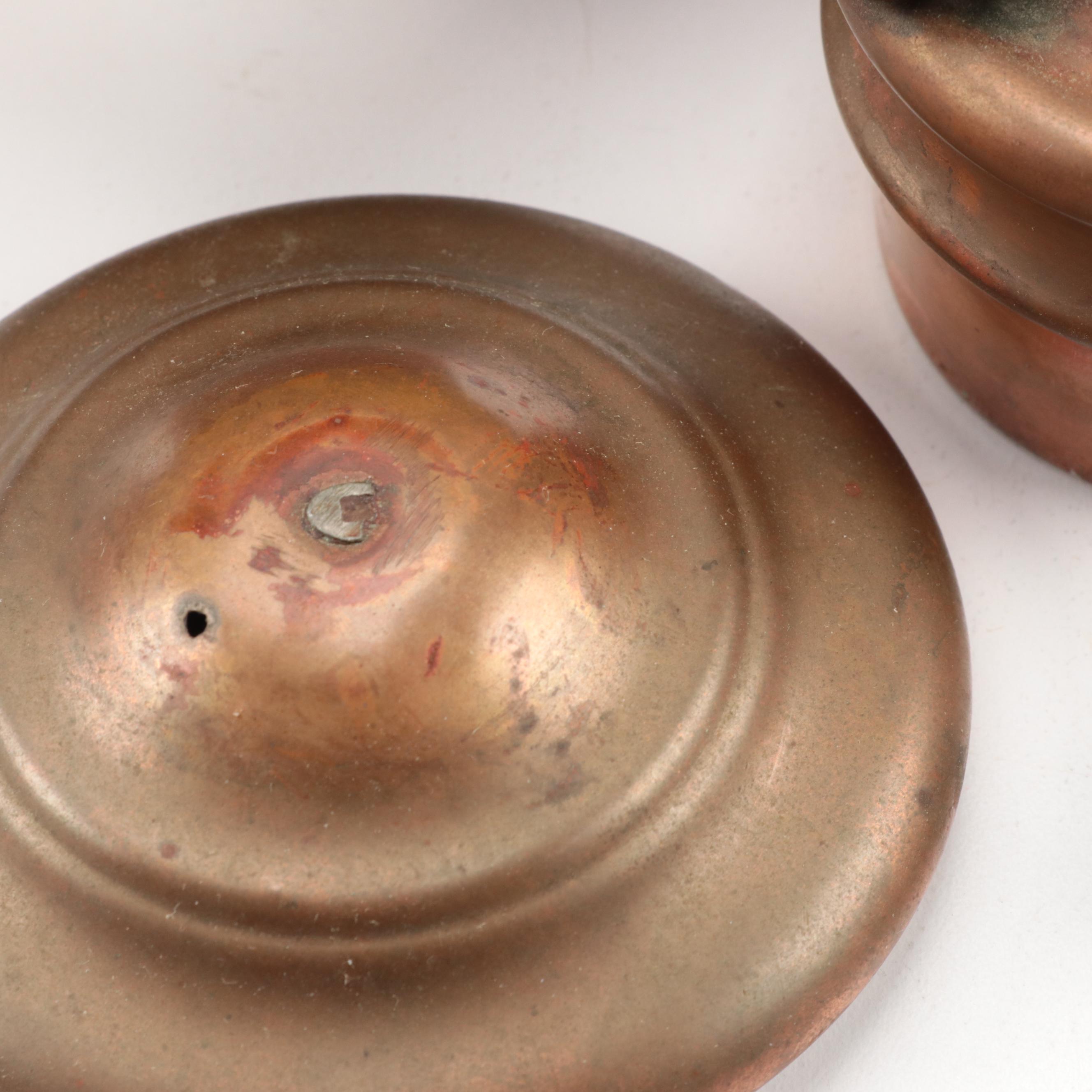 Copper Tilting Teapot with Burner and Ballister Form Brass Candlesticks