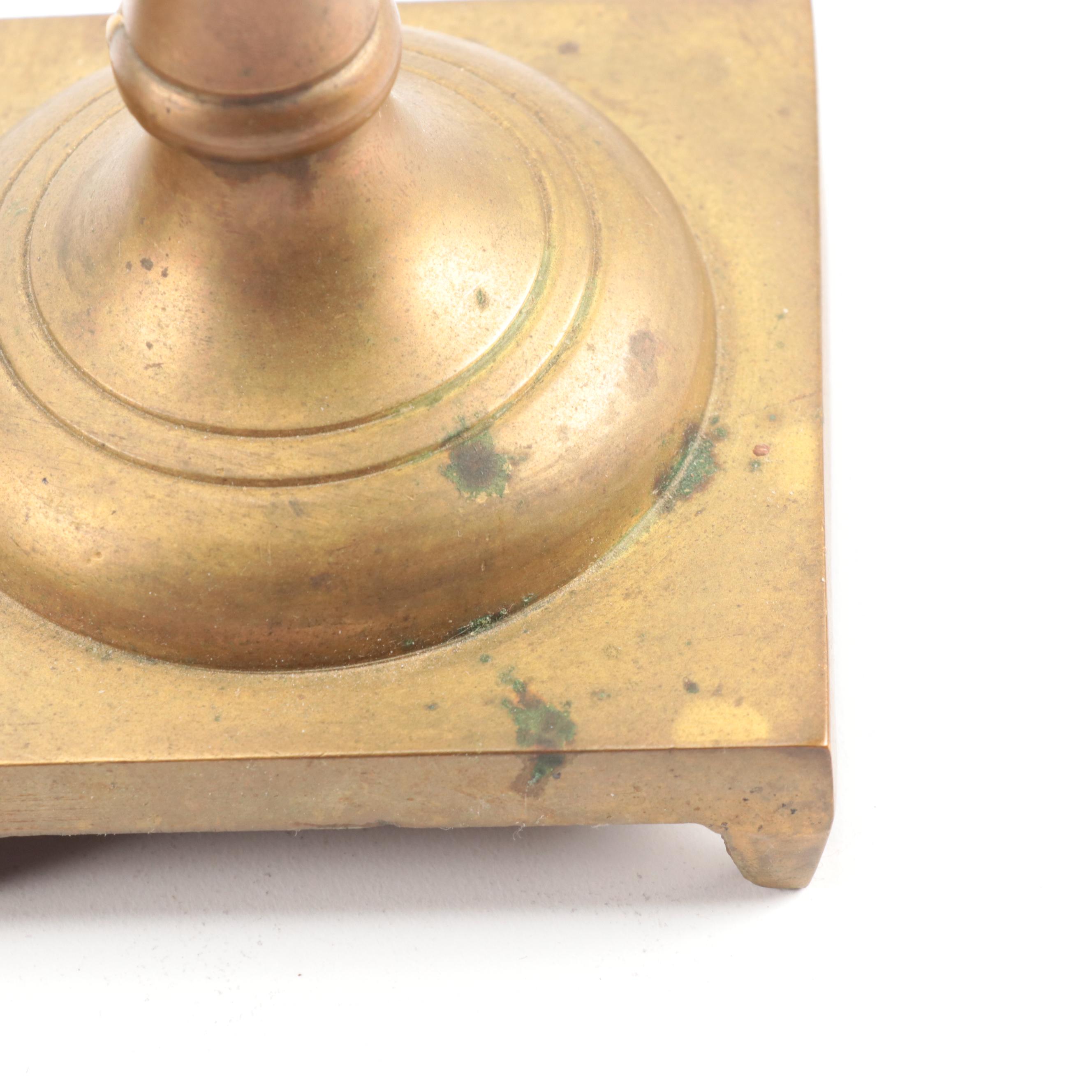 Copper Tilting Teapot with Burner and Ballister Form Brass Candlesticks