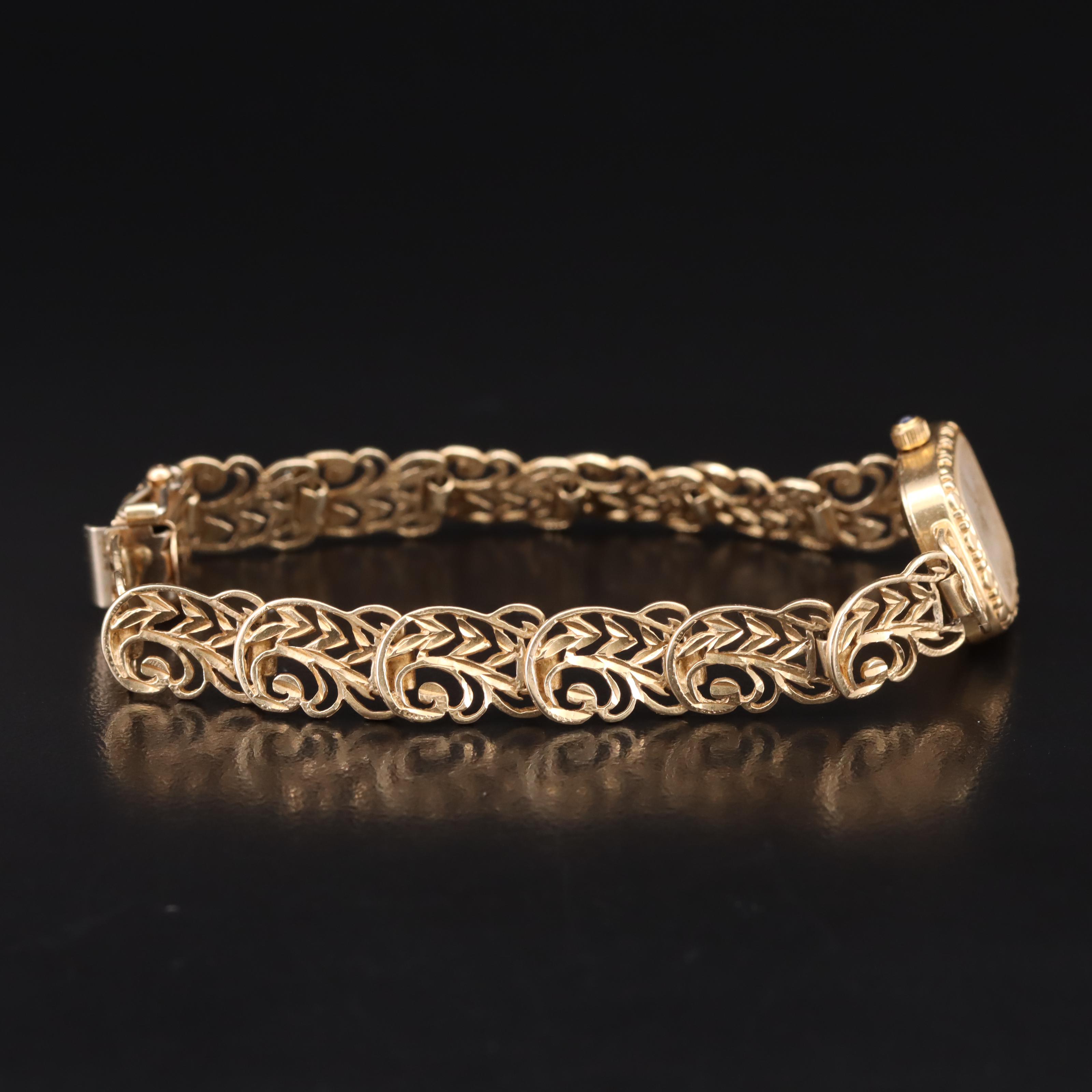 14K Michael Anthony Swiss Quartz Mother-of-Pearl Dial Watch