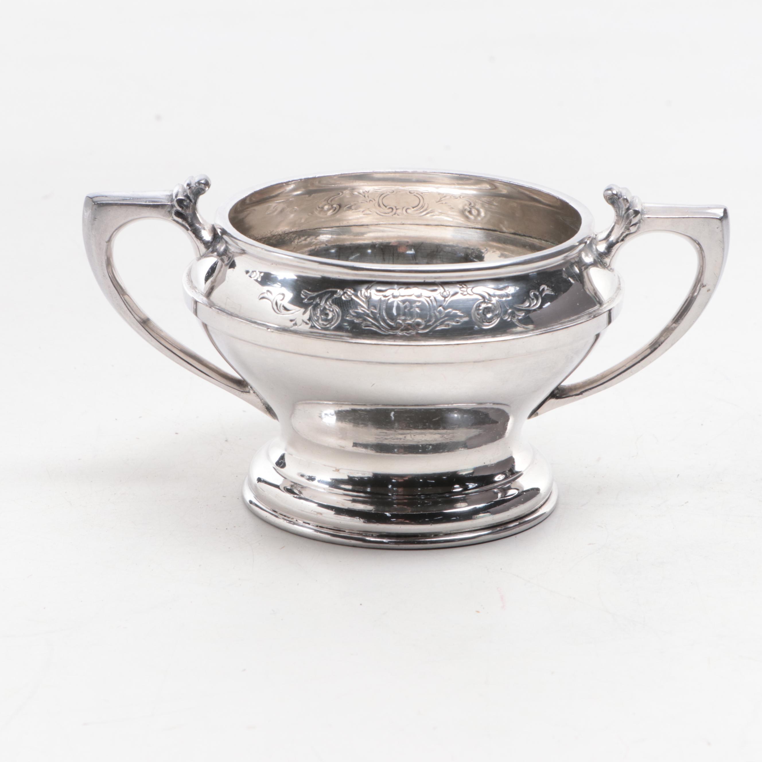 Victorian Moriage Accented Jar with Silver Plate Sugar Bowl and Other Tableware