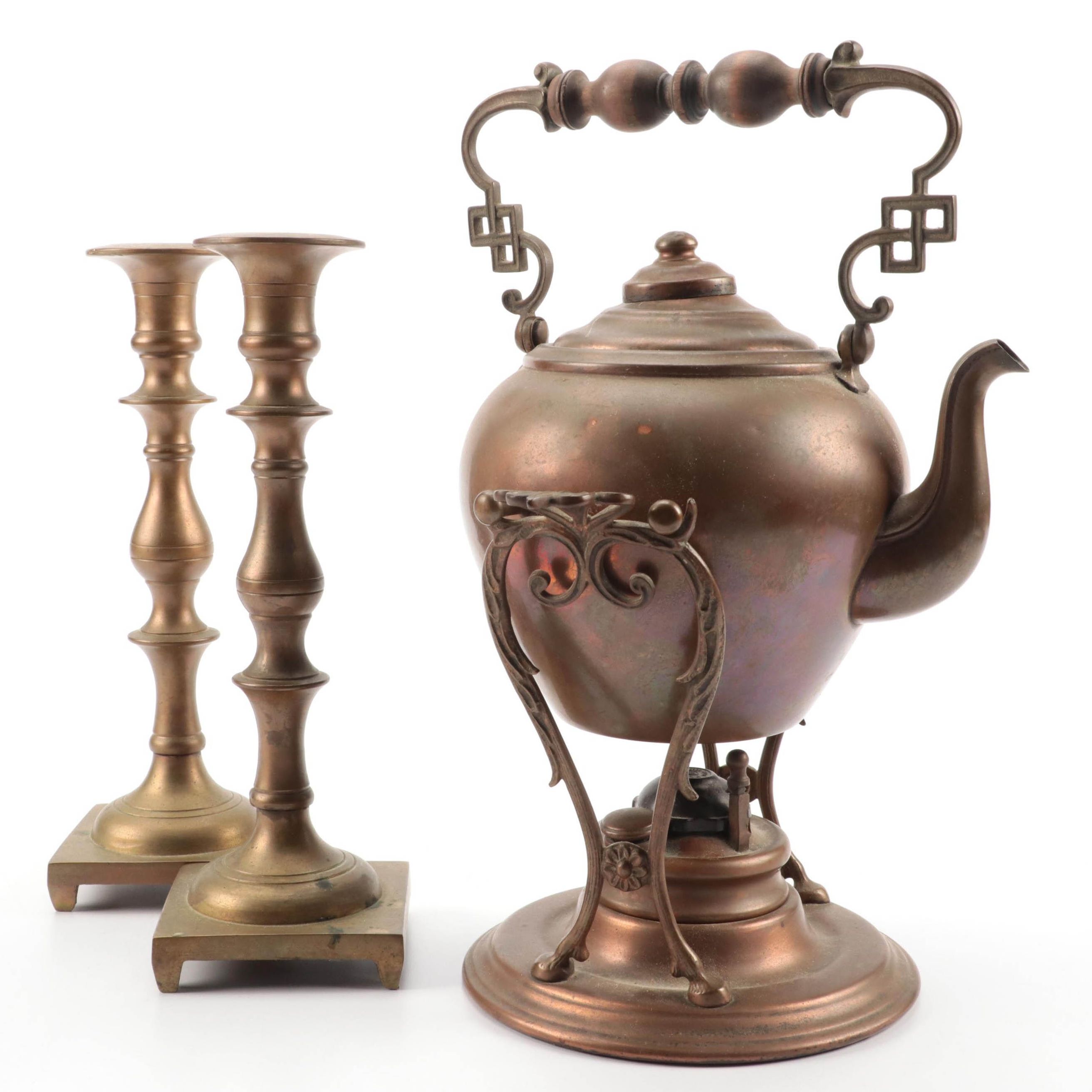 Copper Tilting Teapot with Burner and Ballister Form Brass Candlesticks