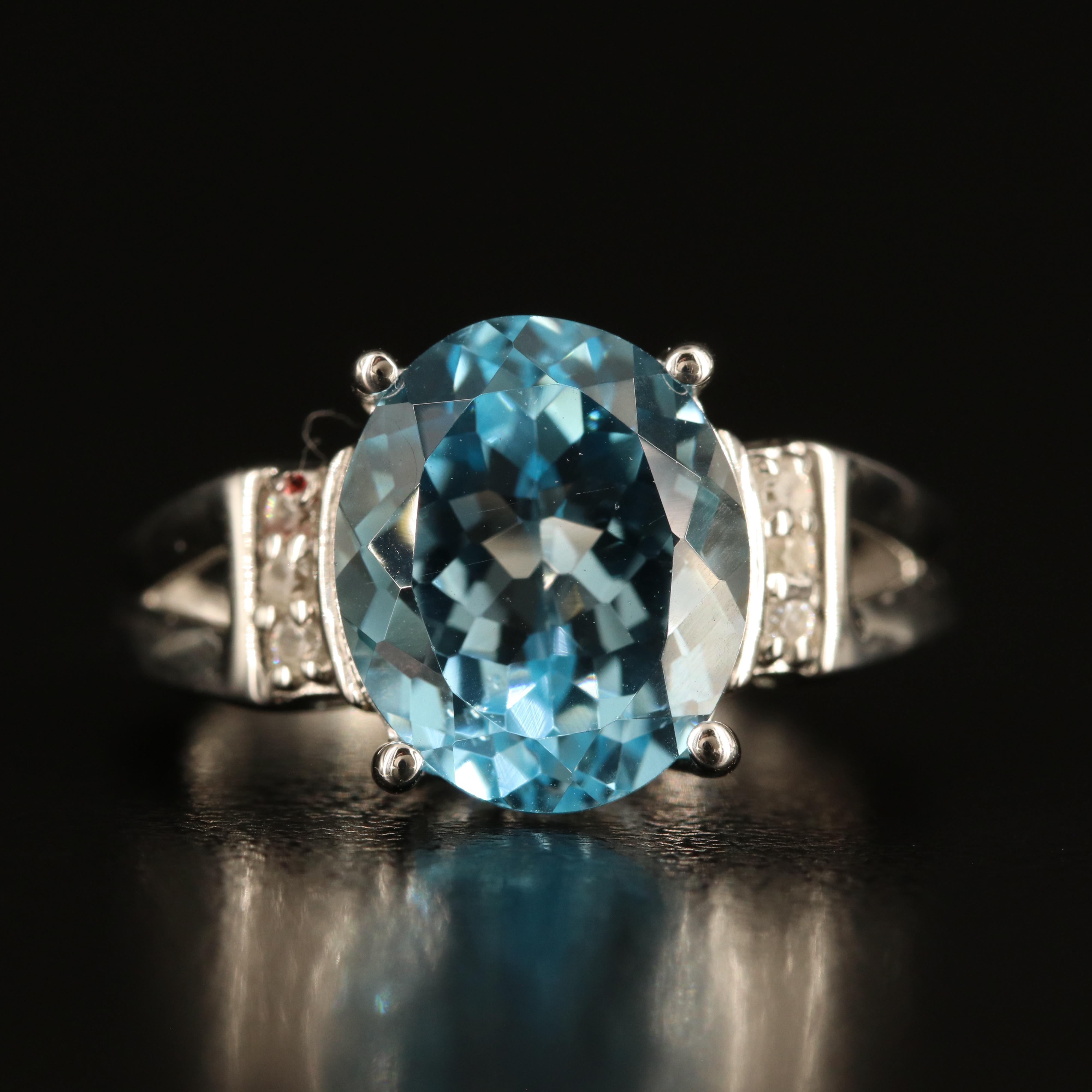 Sterling Sky Blue Topaz and White Zircon Ring