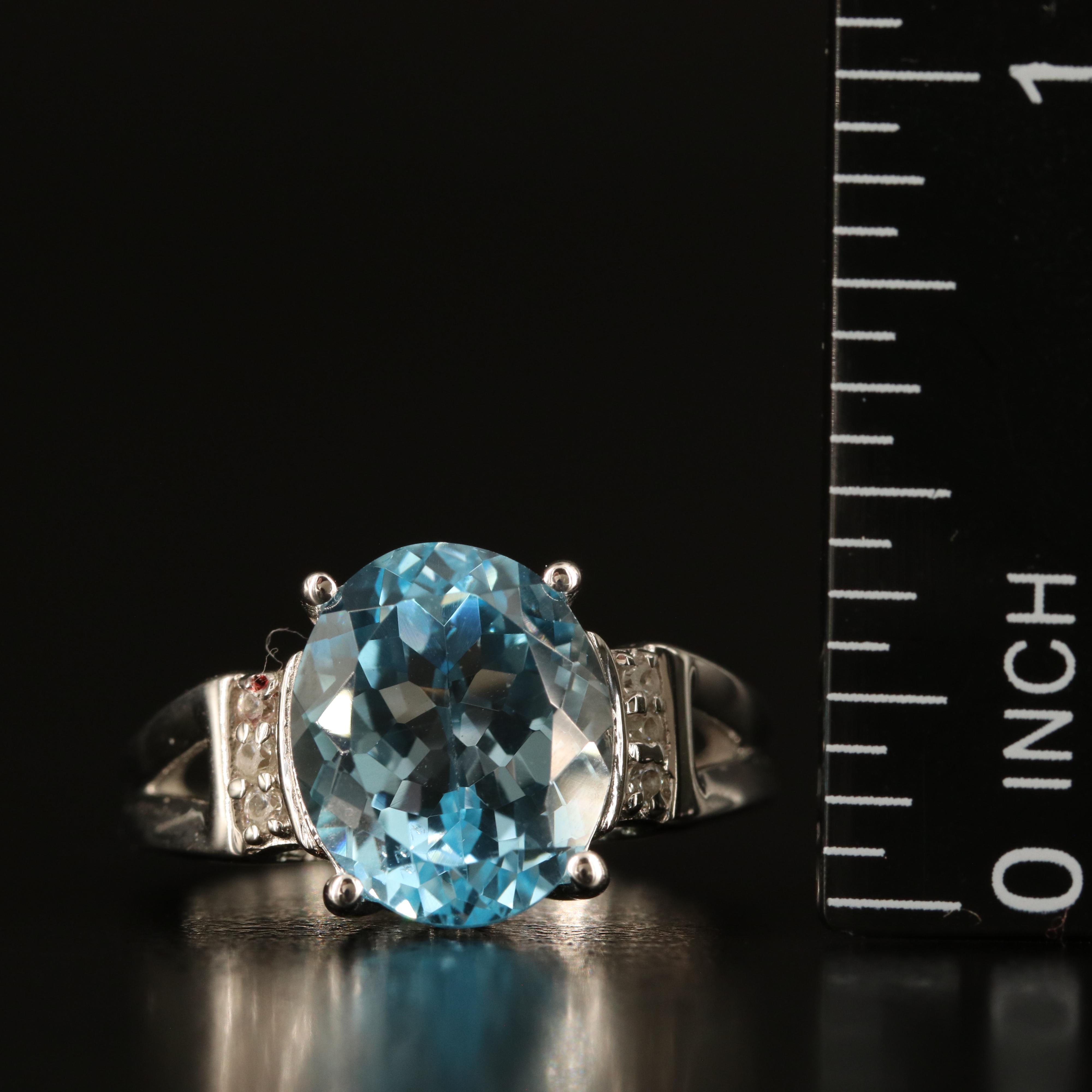Sterling Sky Blue Topaz and White Zircon Ring