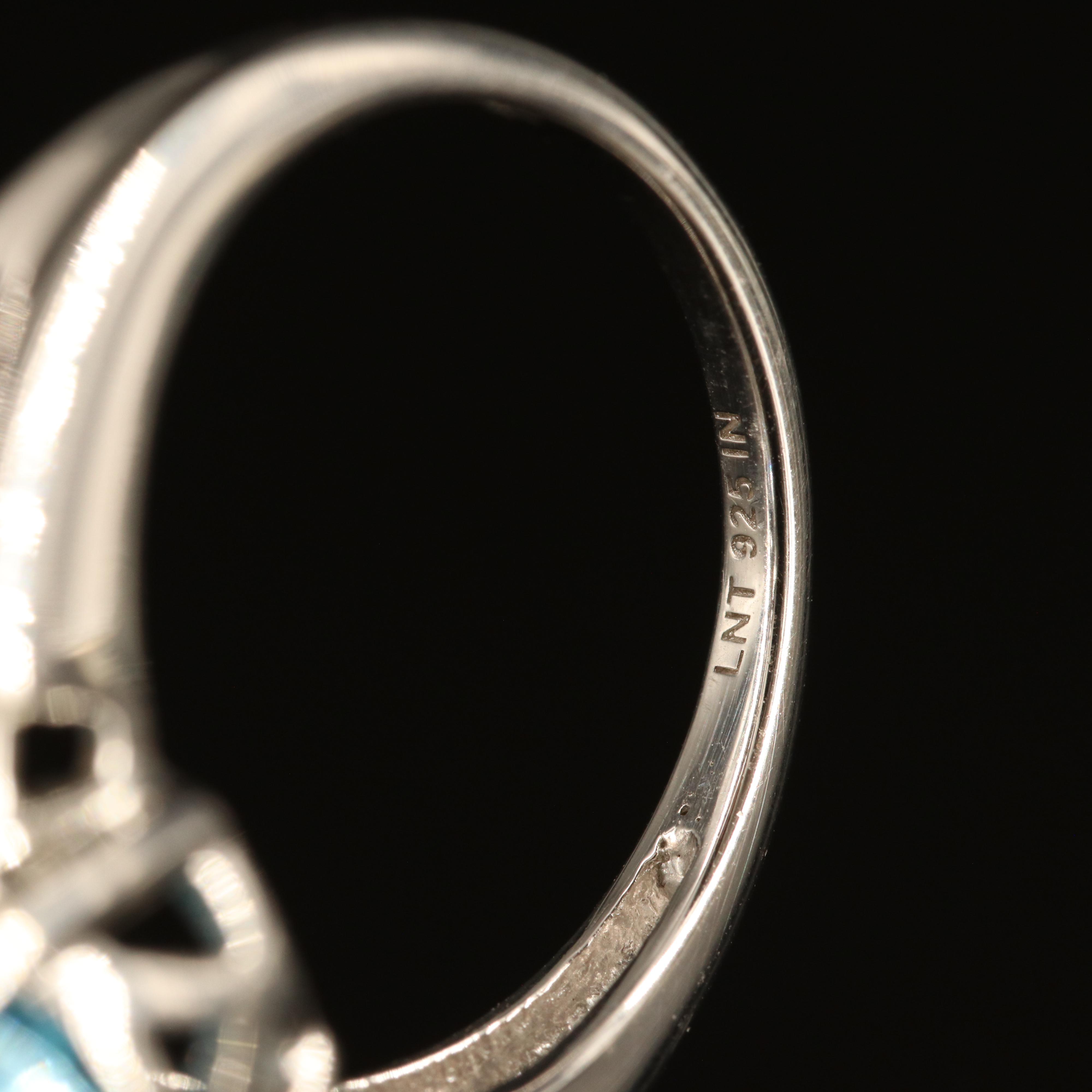 Sterling Sky Blue Topaz and White Zircon Ring