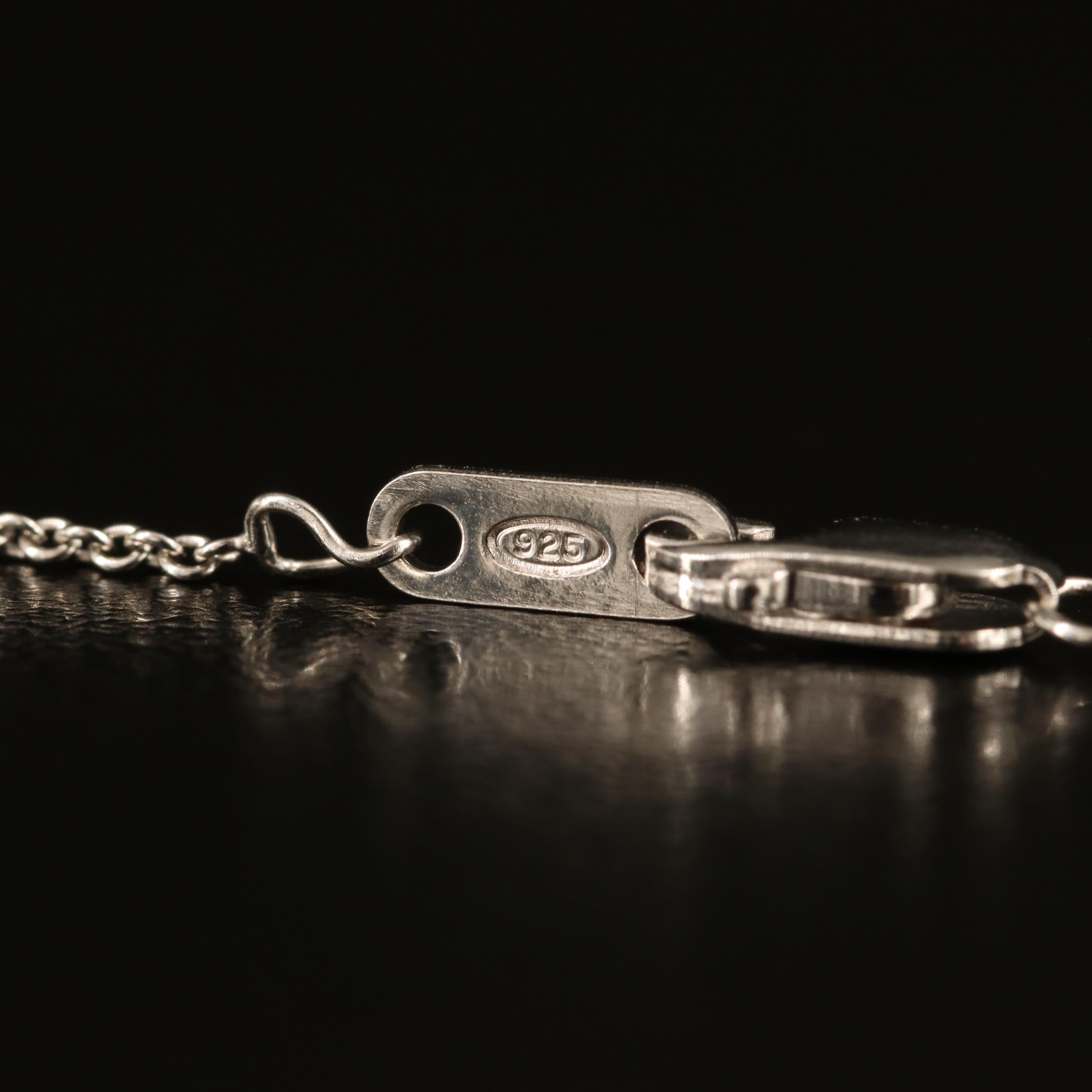 Sterling Ruby and White Sapphire Graduated Heart Pendant Necklace