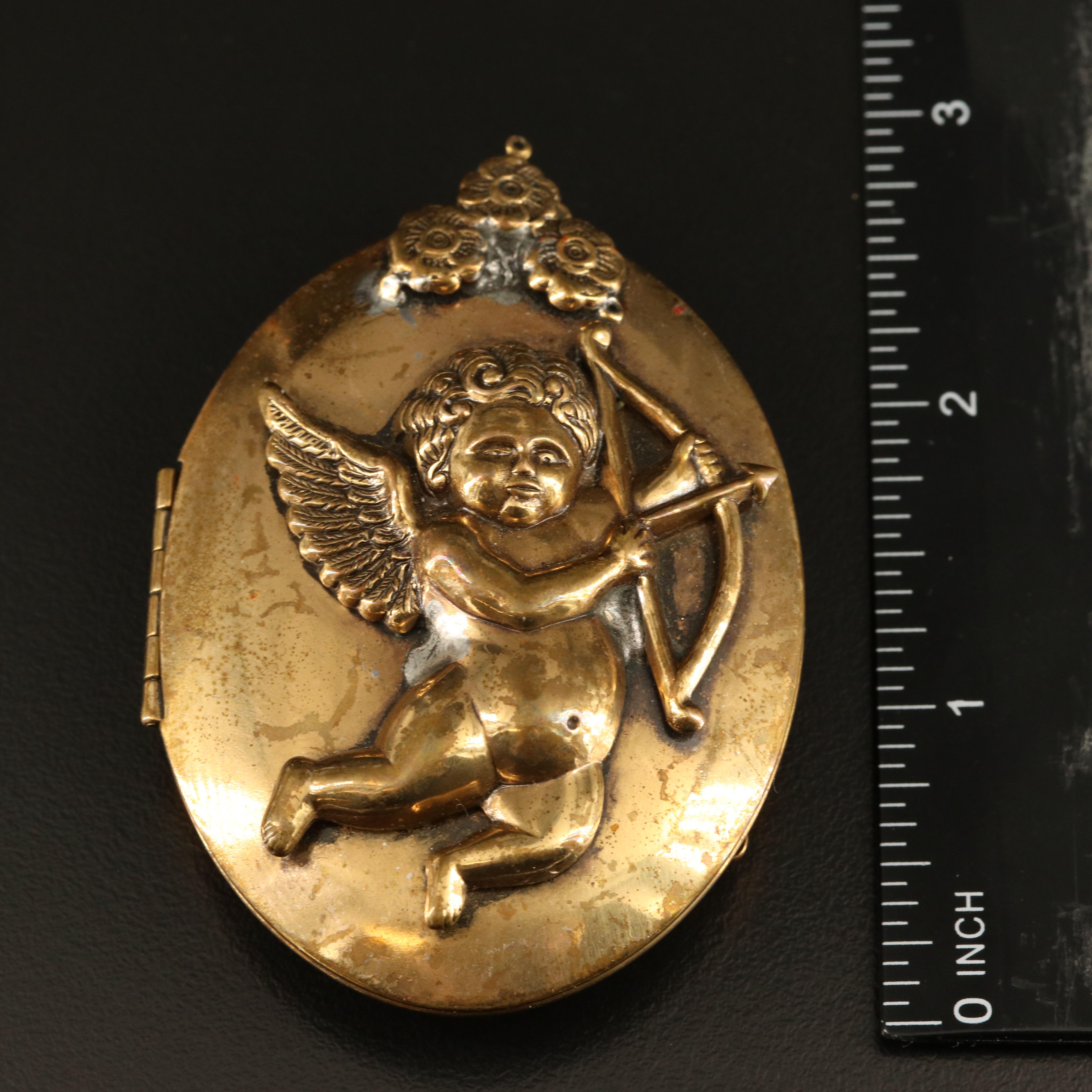 Rhinestones, Cherub Locket and Lions Featured in Jewelry Collection