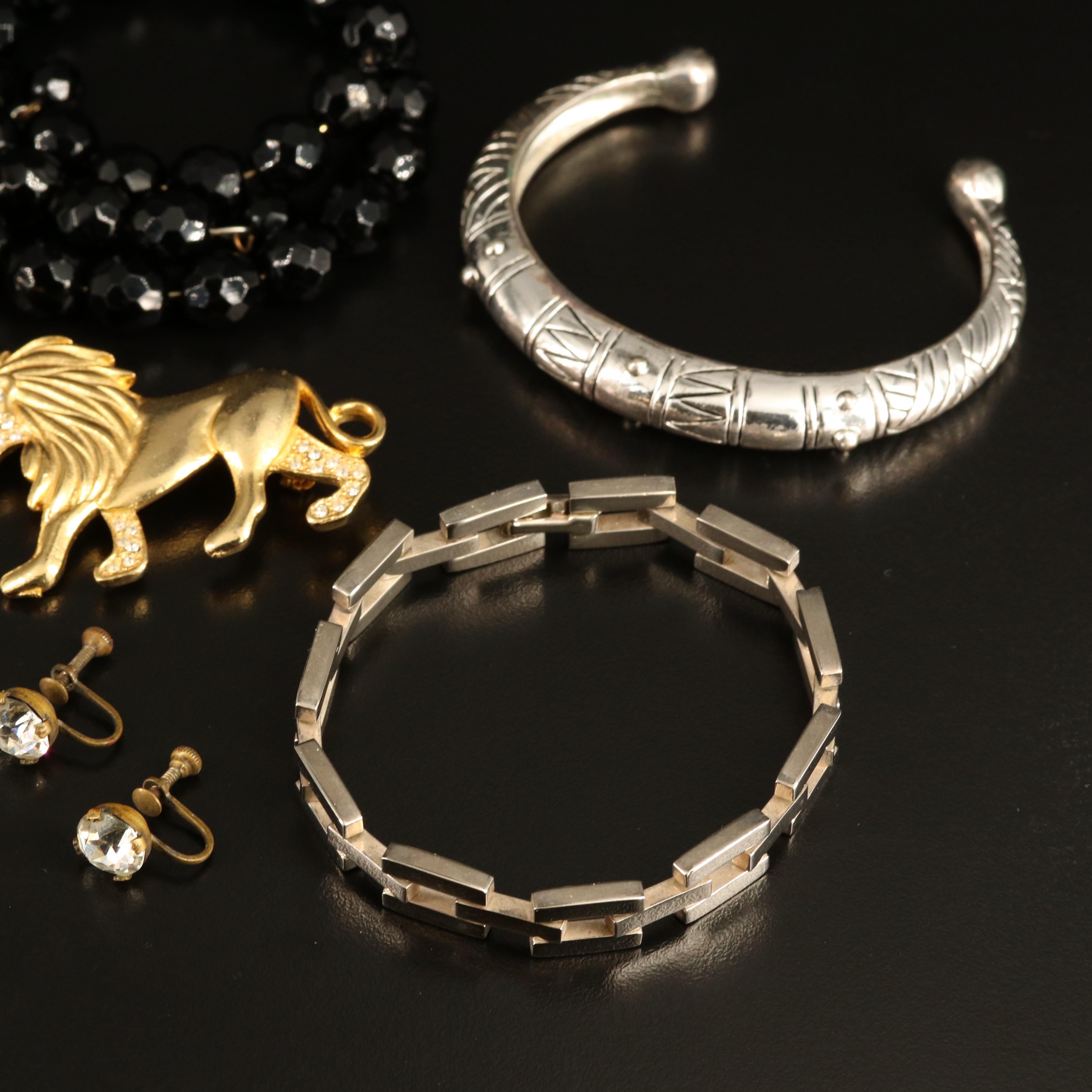 Rhinestones, Cherub Locket and Lions Featured in Jewelry Collection