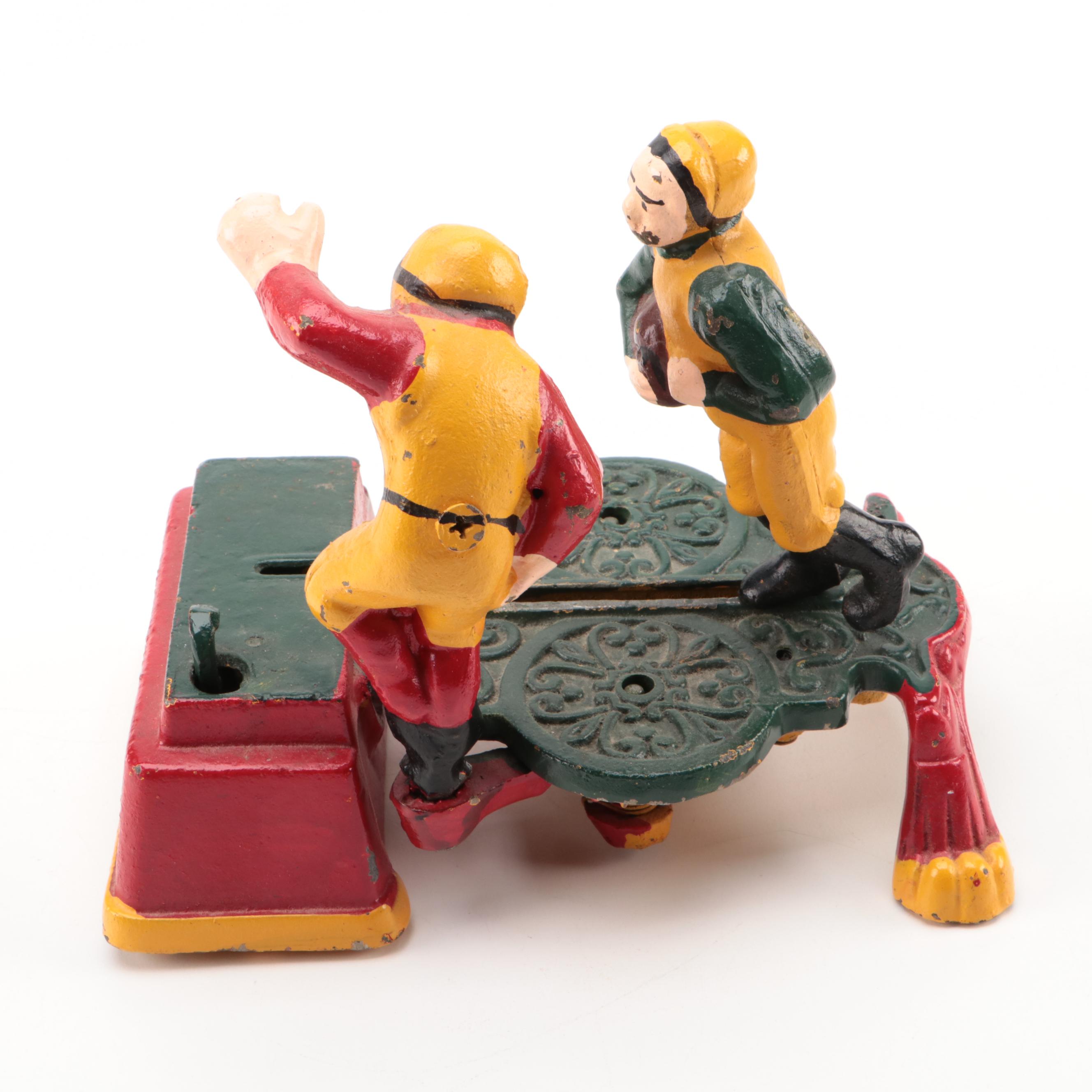 Clown Figure and Calamity Football Mechanical Bank