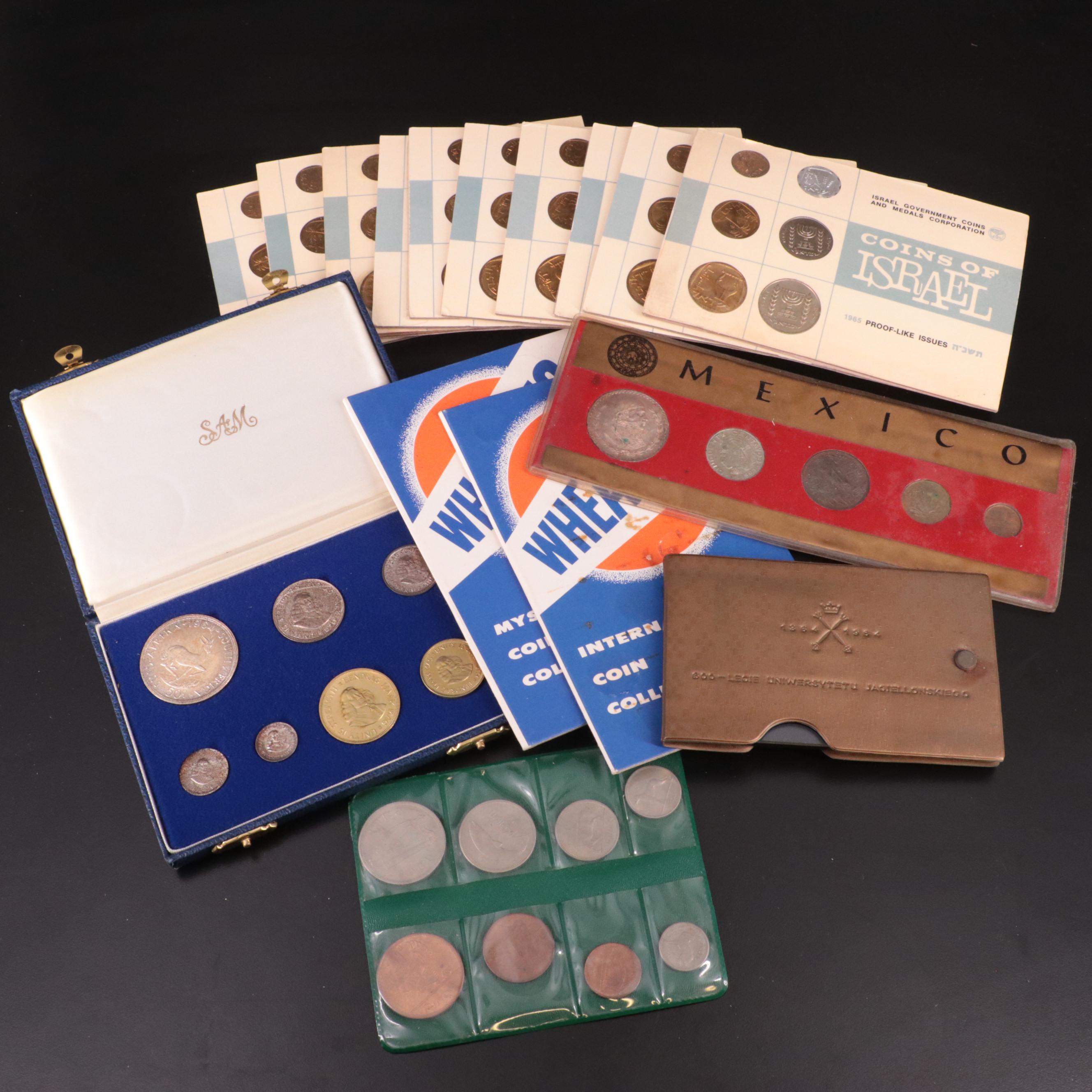 A collection of ten Israel proof like sets and six other proof and mint sets