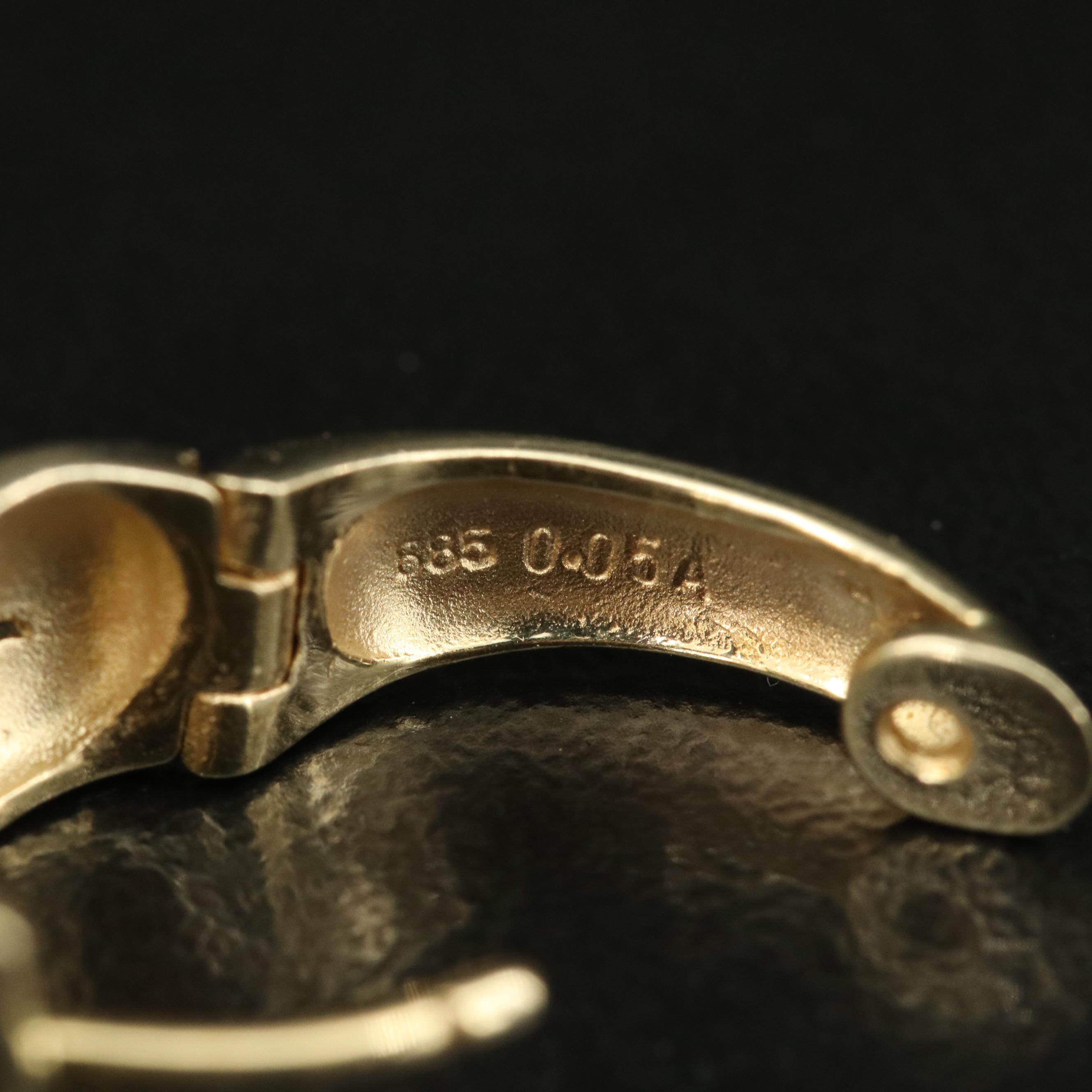 14K Two-Tone 0.10 CTW Diamond Huggie Earrings