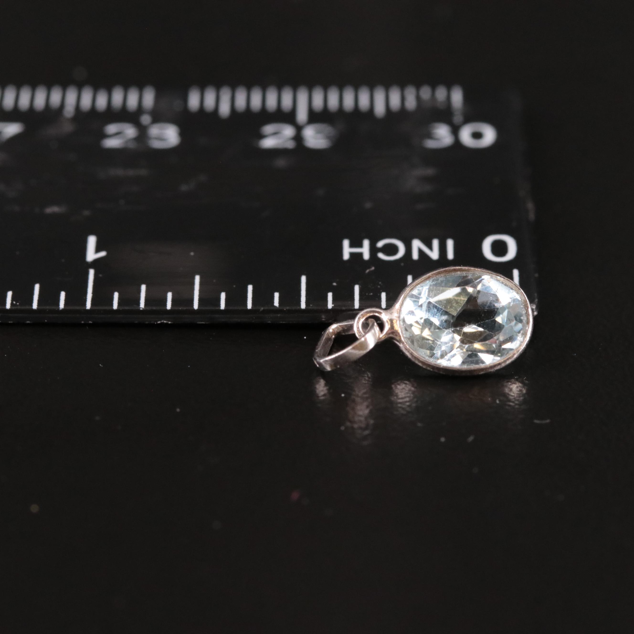 14K Blue Topaz Pendant