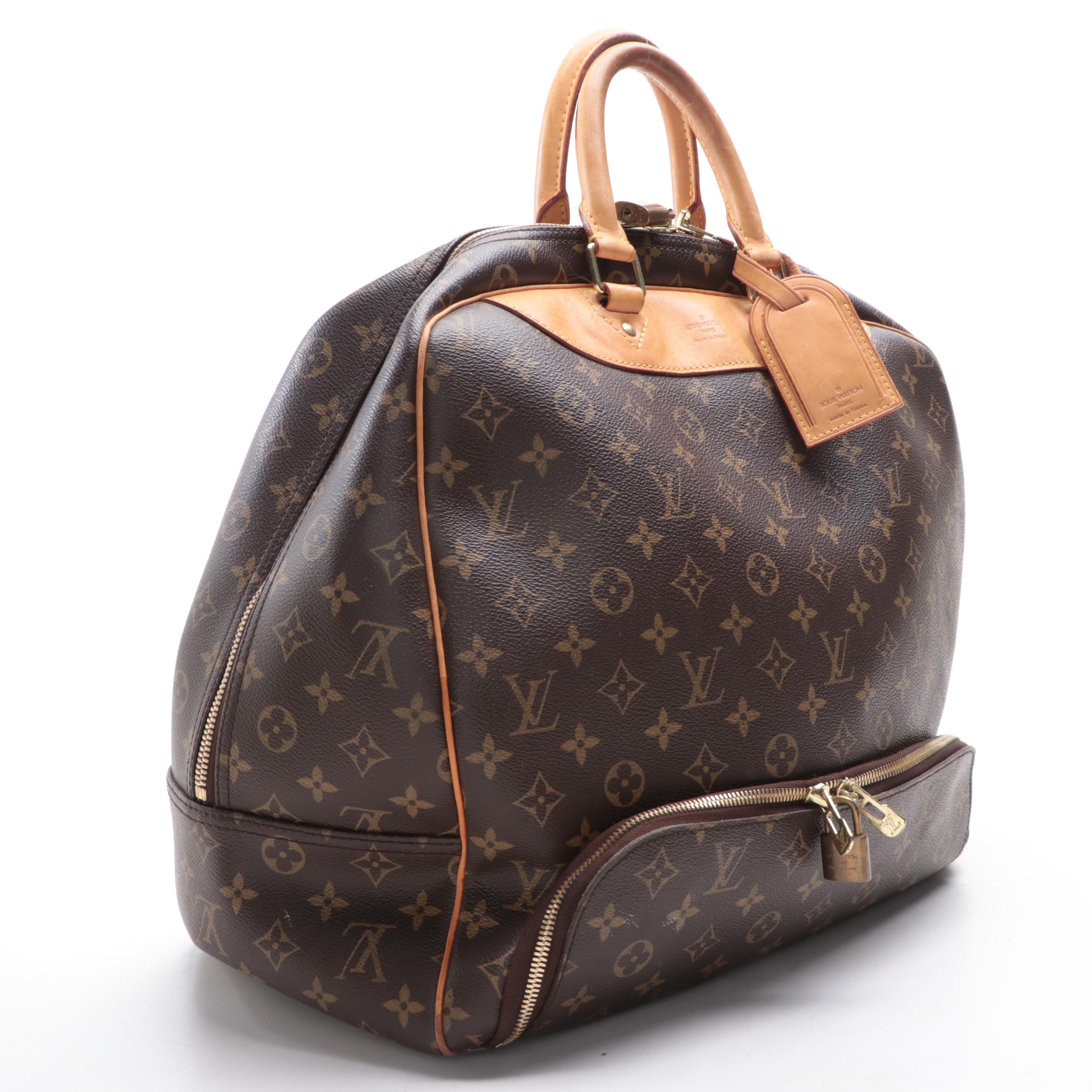 Louis Vuitton Evasion Travel Bag in Monogram Canvas and Vachetta Leather