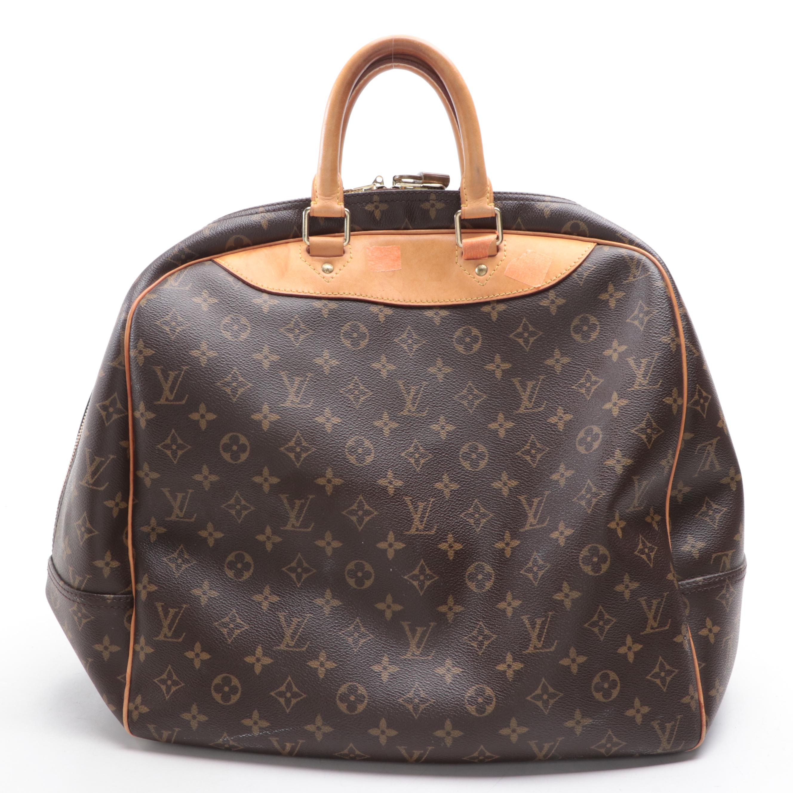 Louis Vuitton Evasion Travel Bag in Monogram Canvas and Vachetta Leather