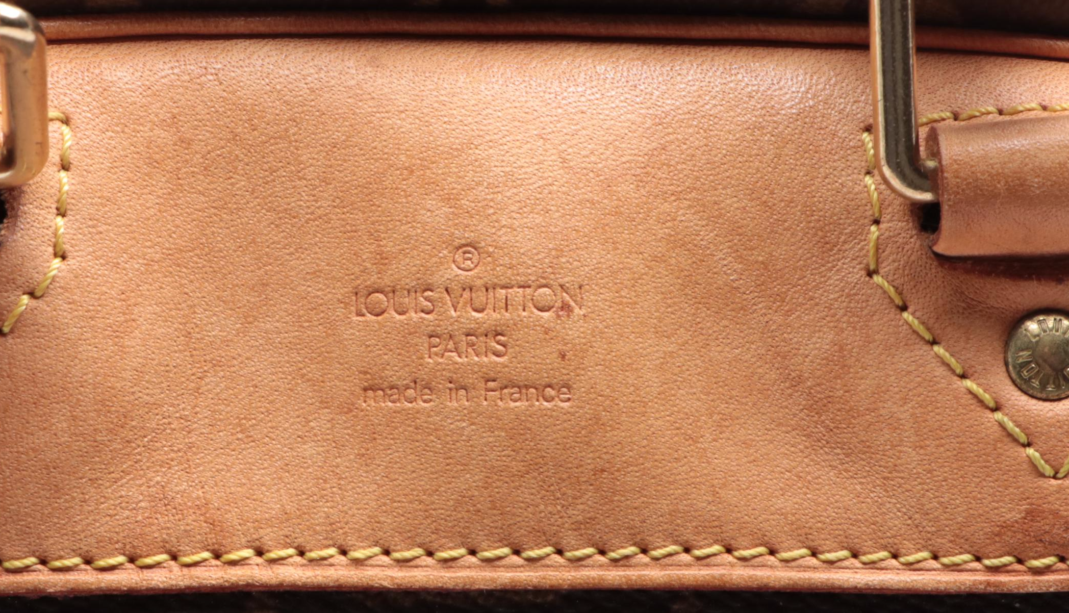 Louis Vuitton Evasion Travel Bag in Monogram Canvas and Vachetta Leather