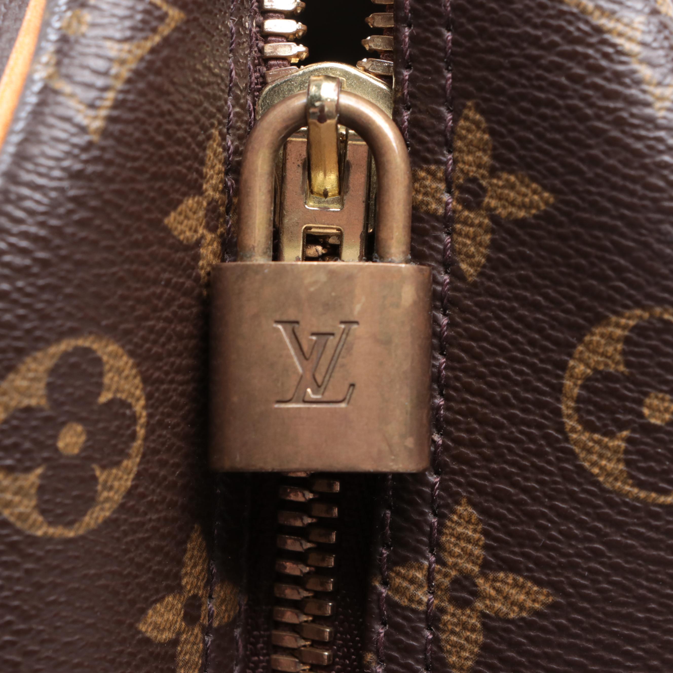 Louis Vuitton Evasion Travel Bag in Monogram Canvas and Vachetta Leather