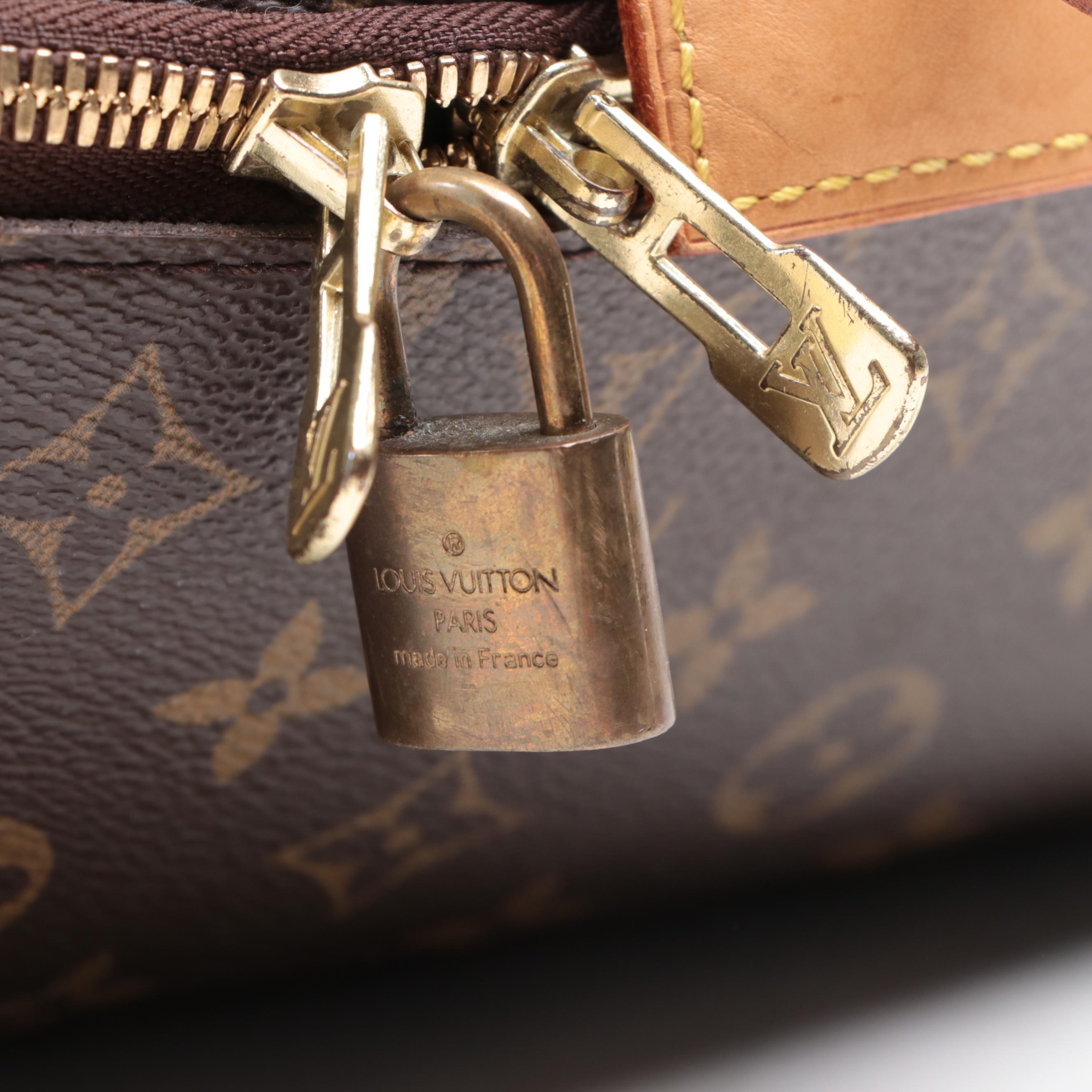 Louis Vuitton Evasion Travel Bag in Monogram Canvas and Vachetta Leather