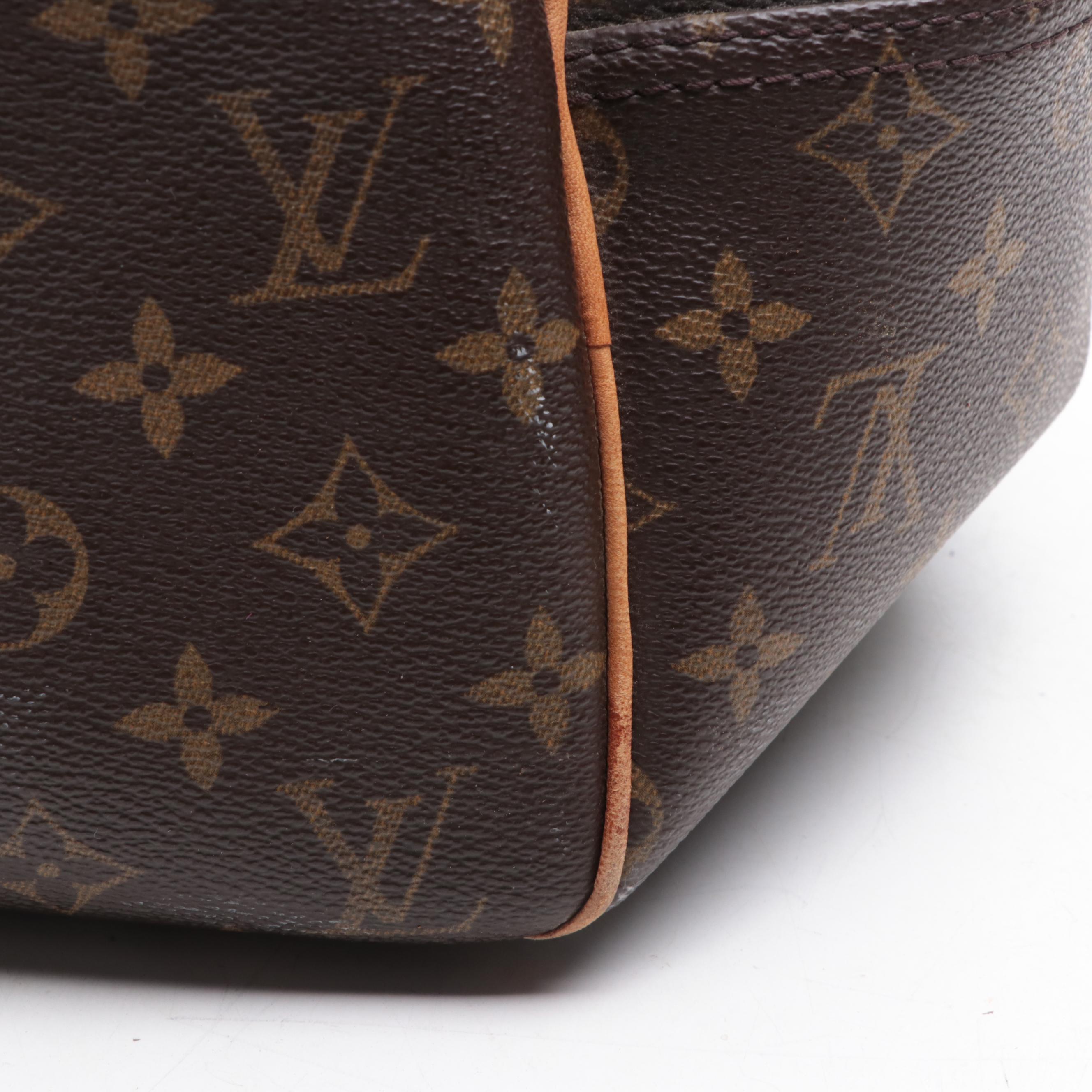 Louis Vuitton Evasion Travel Bag in Monogram Canvas and Vachetta Leather