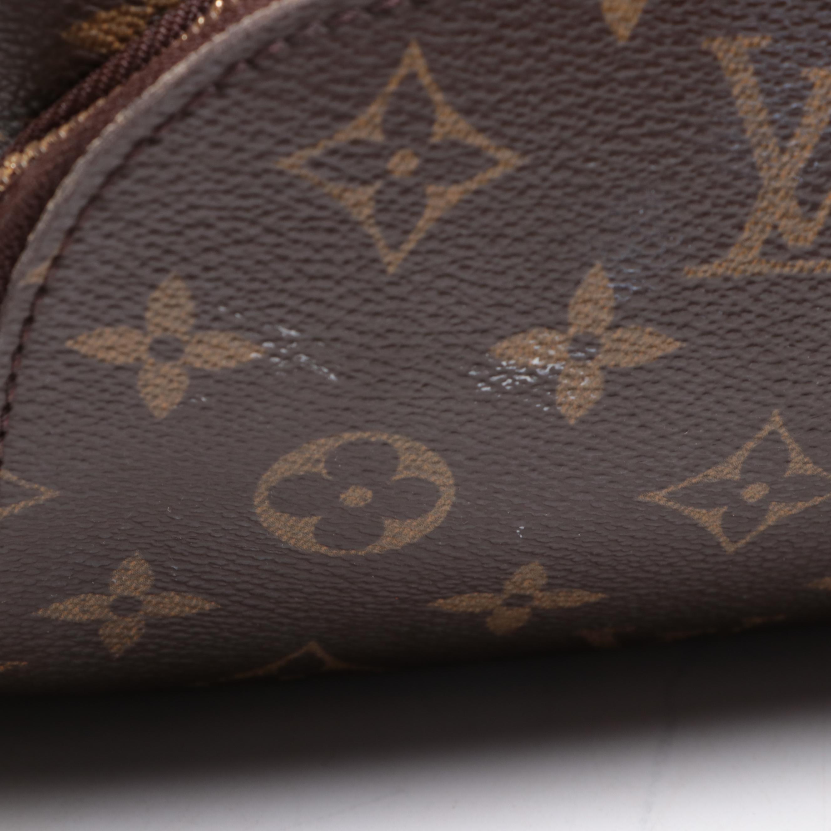Louis Vuitton Evasion Travel Bag in Monogram Canvas and Vachetta Leather