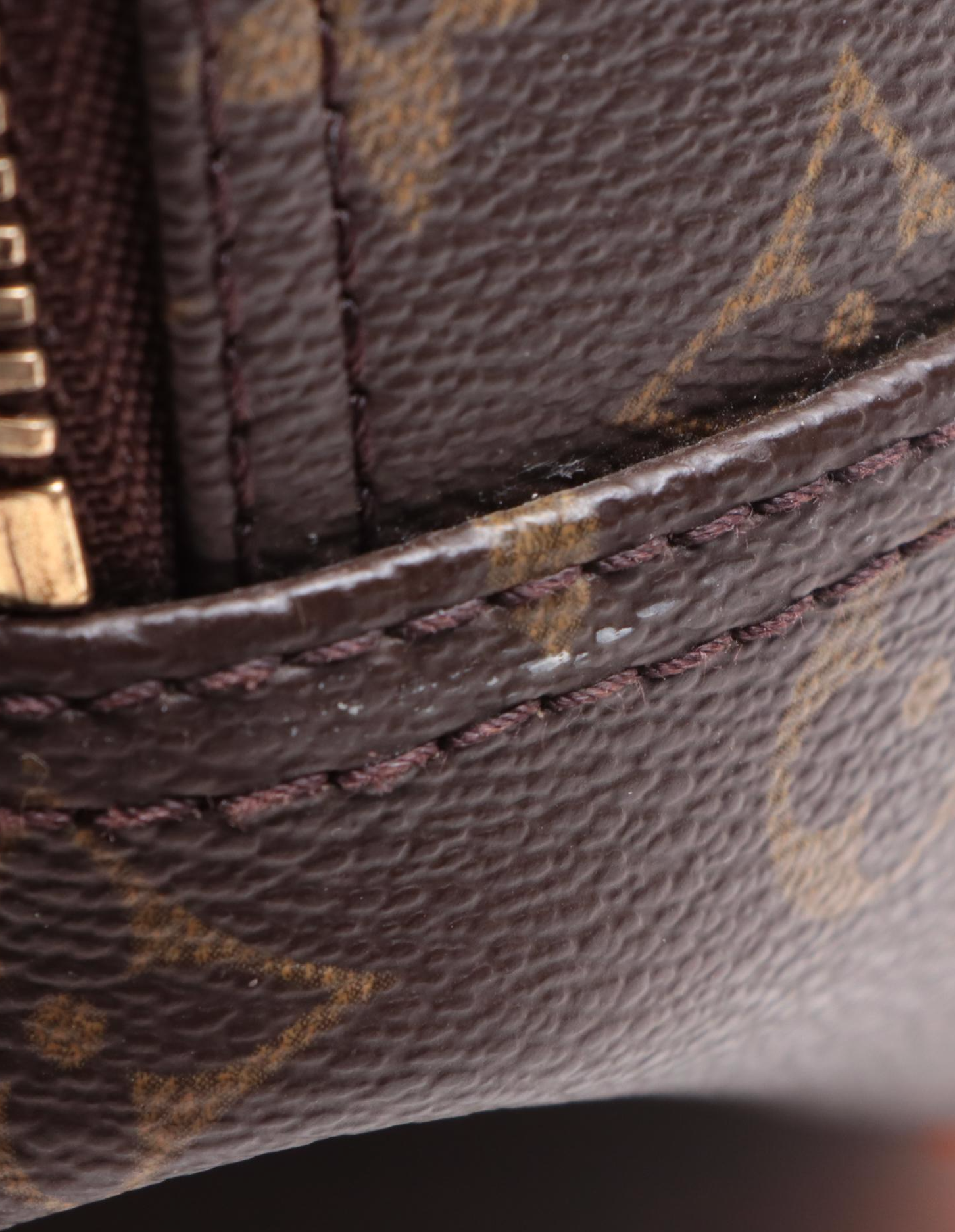 Louis Vuitton Evasion Travel Bag in Monogram Canvas and Vachetta Leather