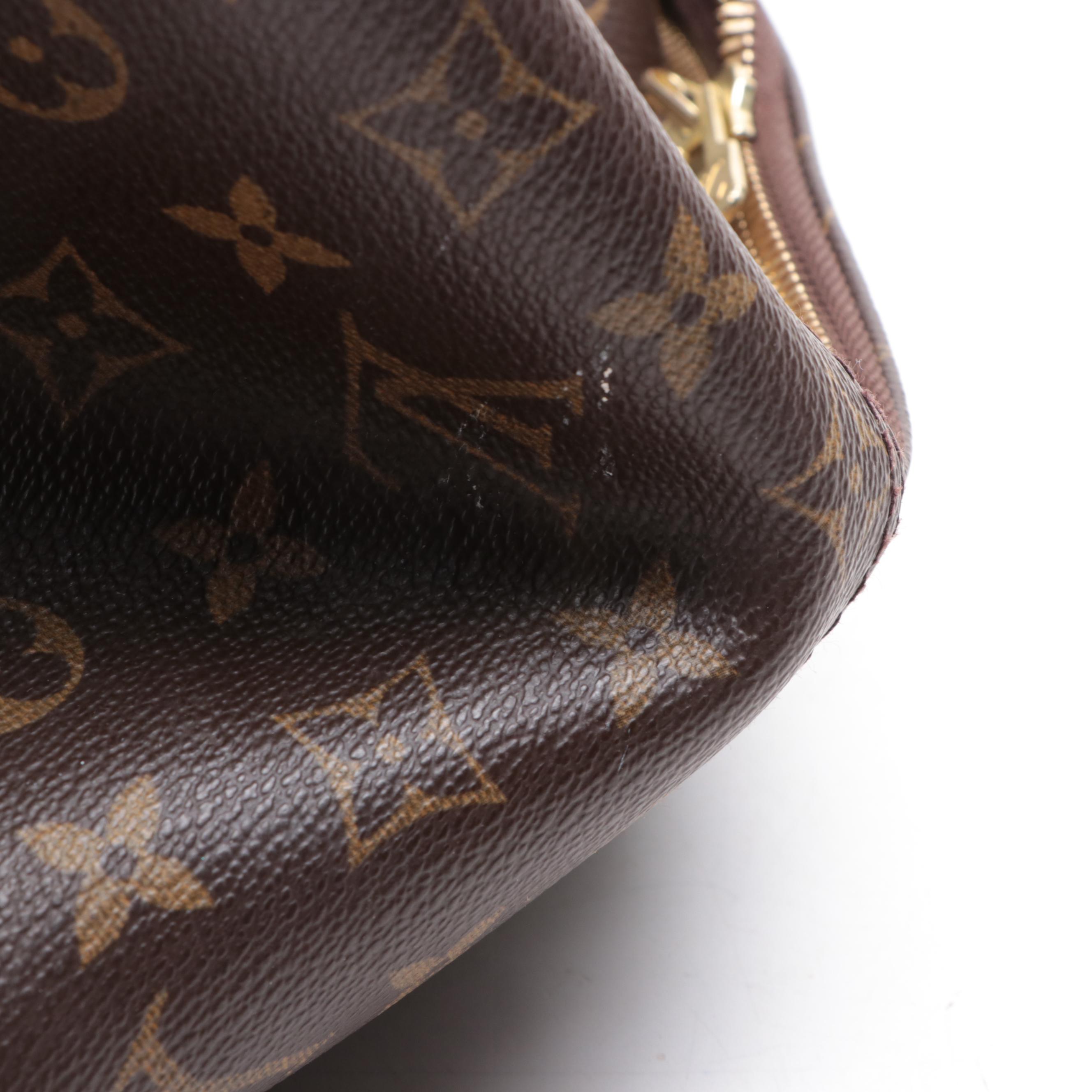 Louis Vuitton Evasion Travel Bag in Monogram Canvas and Vachetta Leather