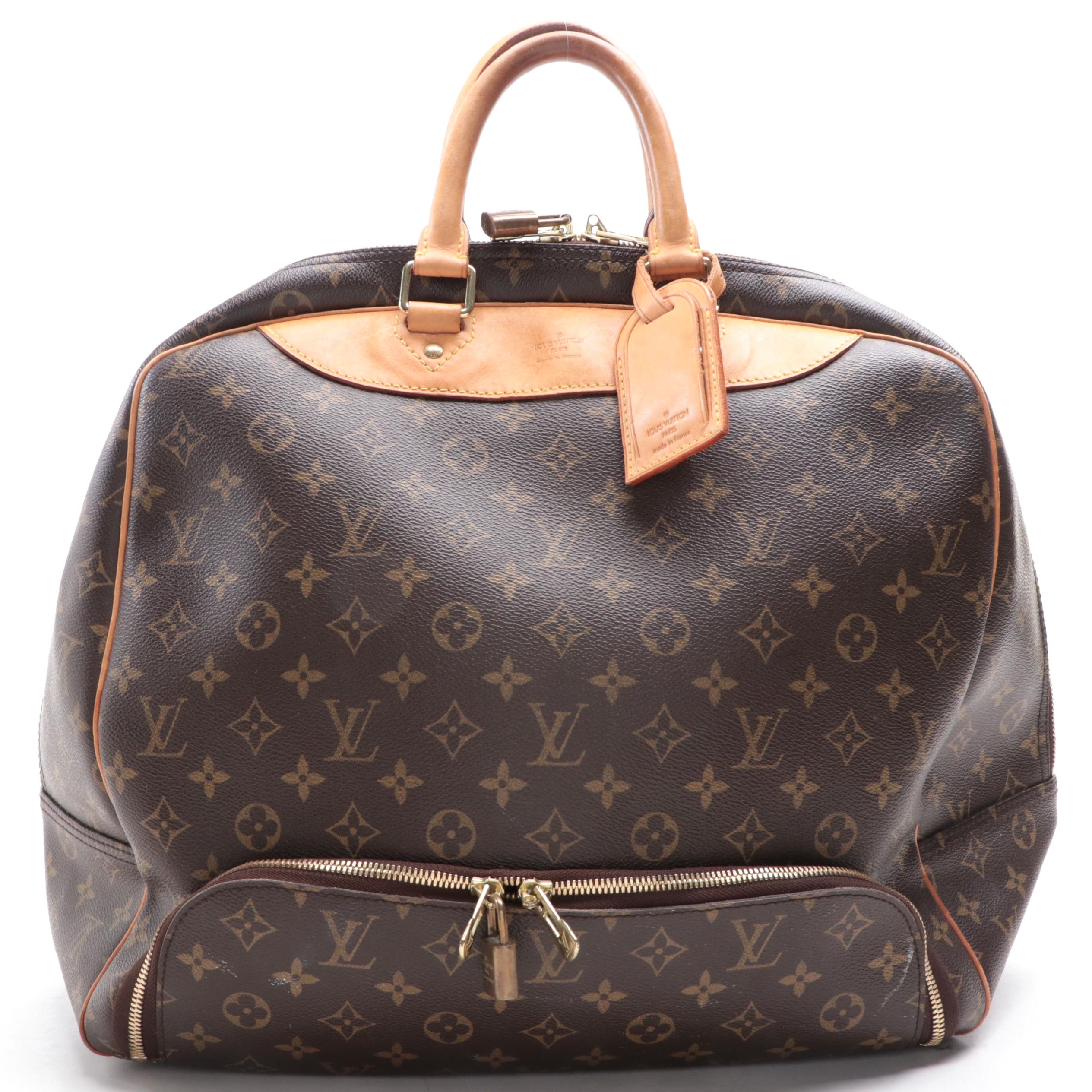 Louis Vuitton Evasion Travel Bag in Monogram Canvas and Vachetta Leather