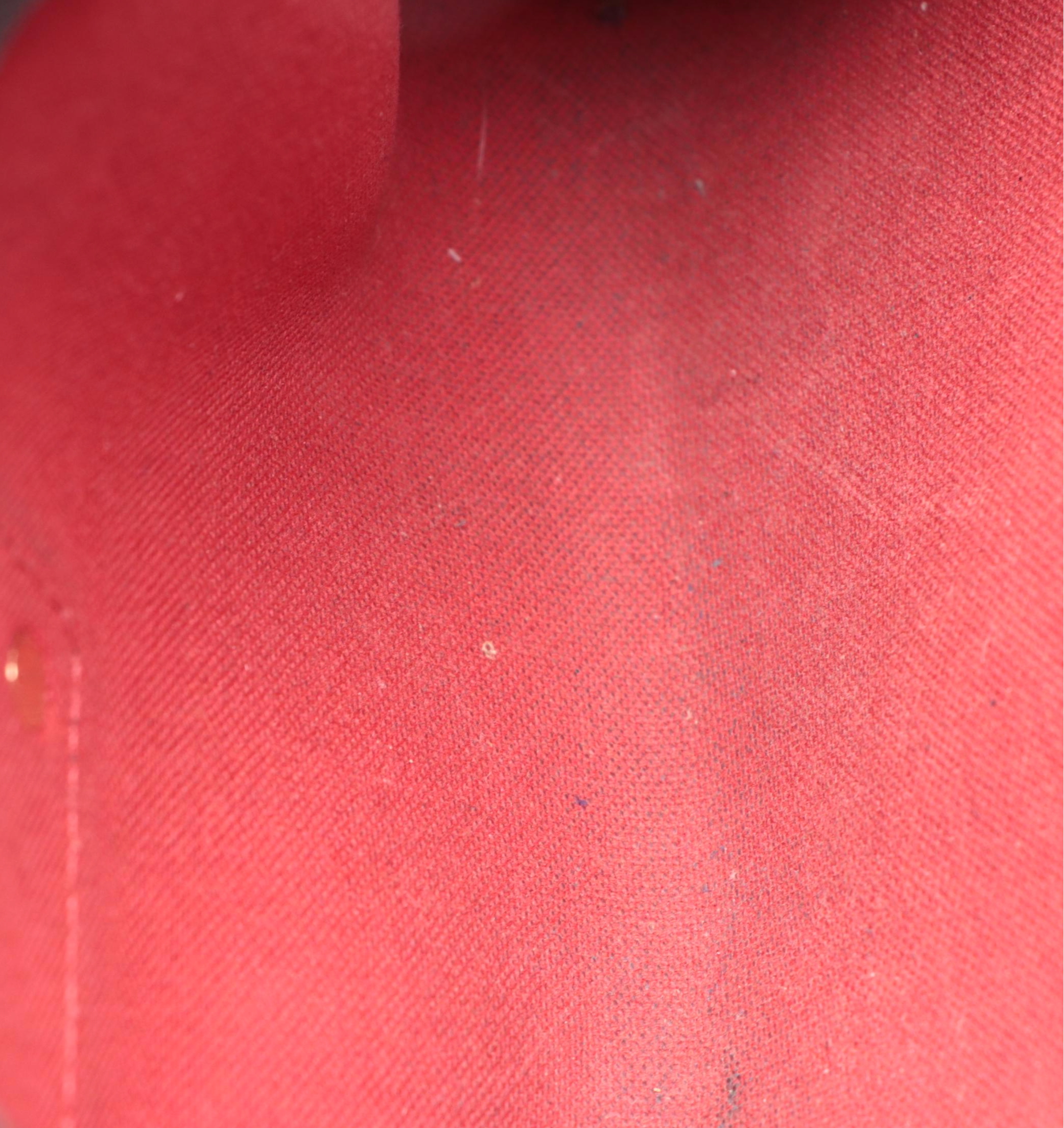 Louis Vuitton Pochette Eva in Damier Ebene Canvas