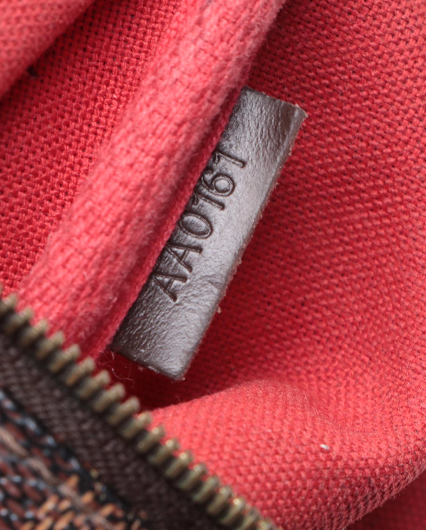 Louis Vuitton Pochette Eva in Damier Ebene Canvas