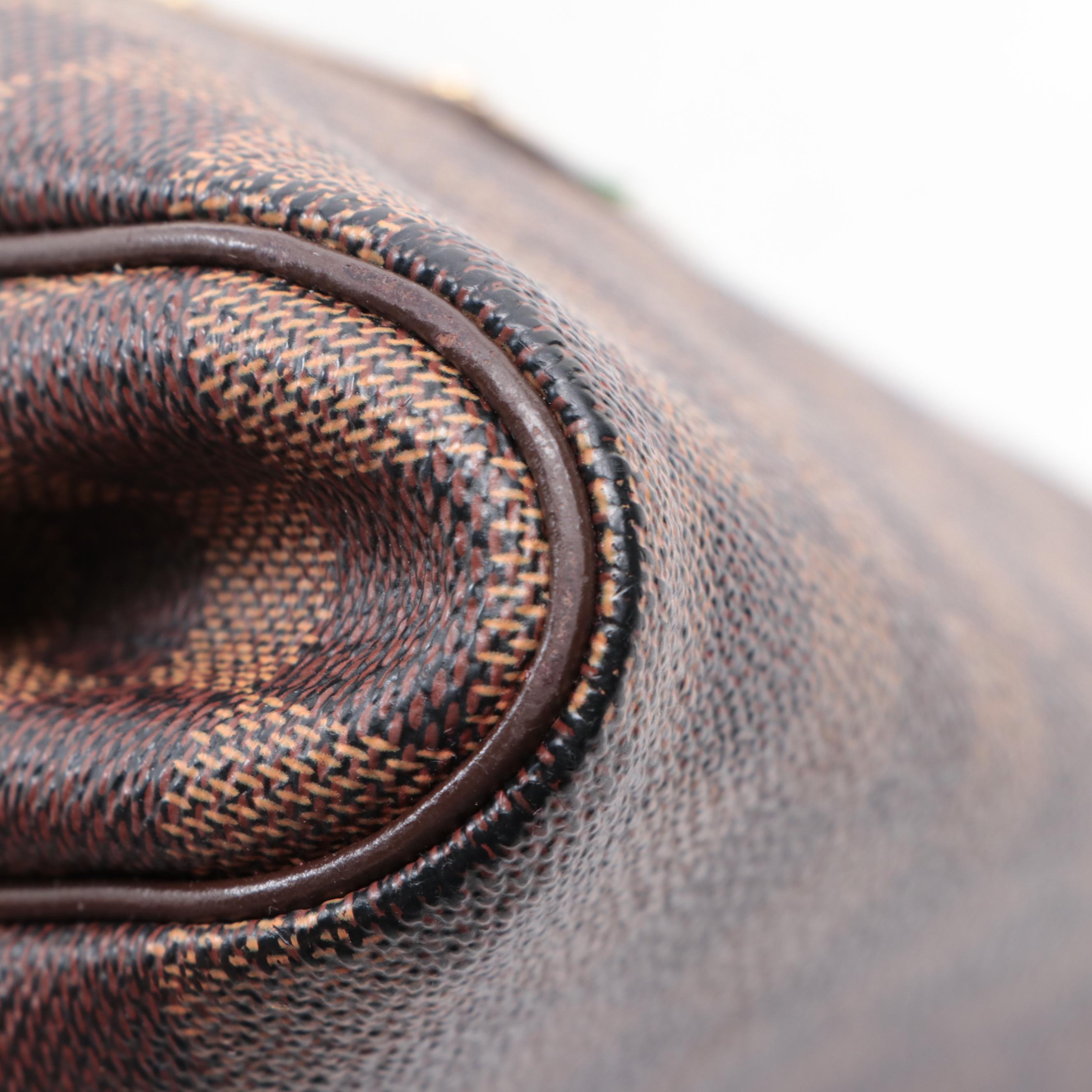 Louis Vuitton Pochette Eva in Damier Ebene Canvas