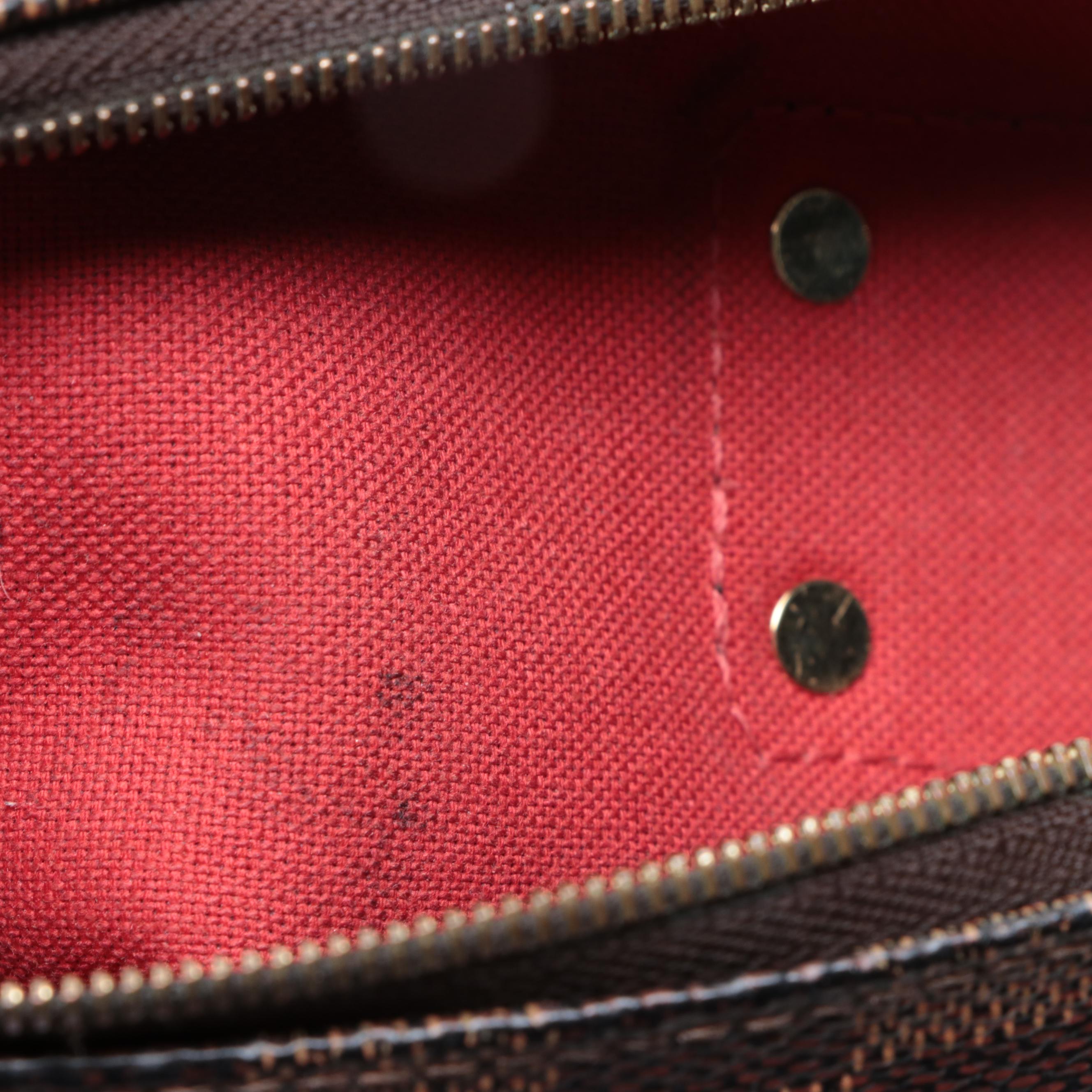 Louis Vuitton Pochette Eva in Damier Ebene Canvas