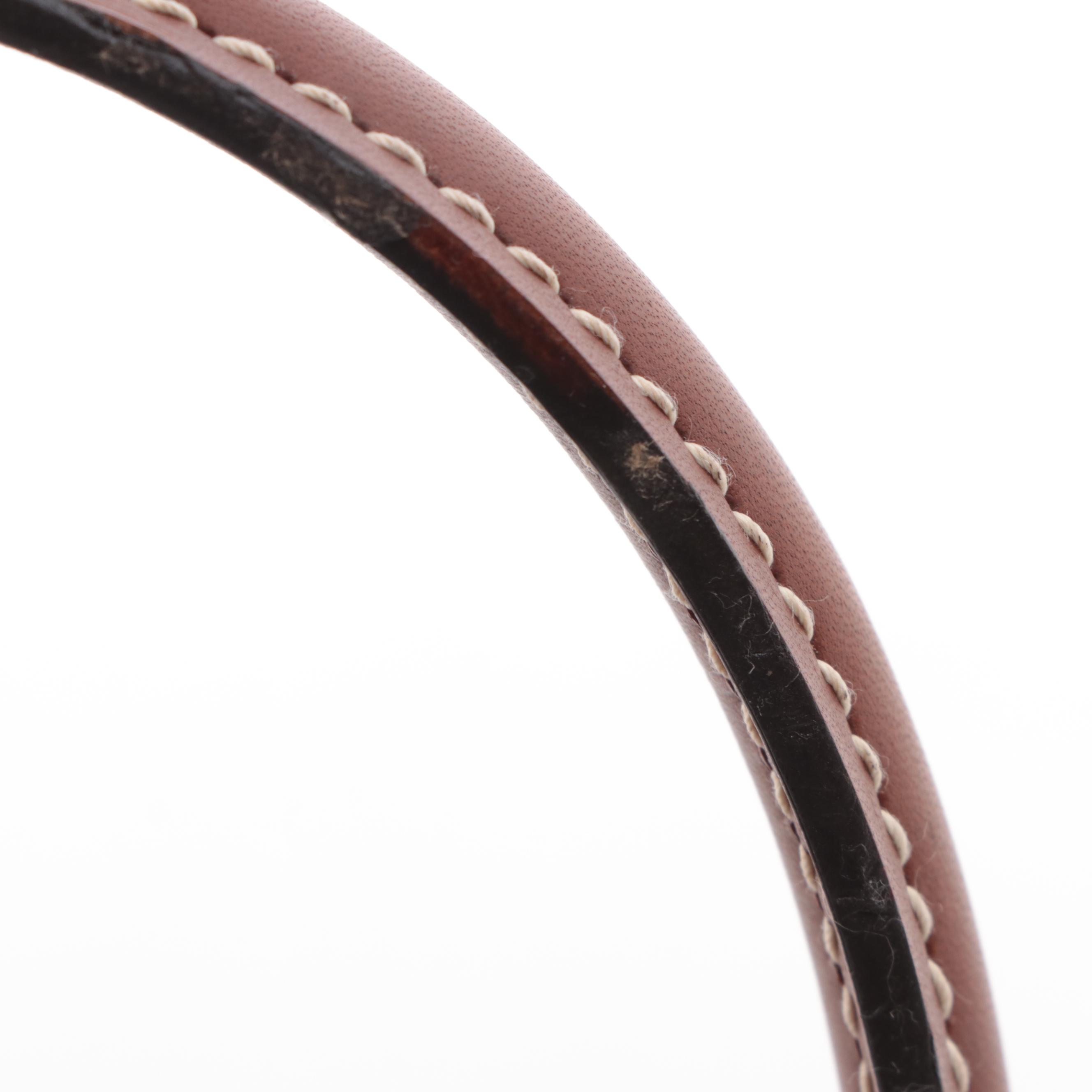 Louis Vuitton W PM Bag in Monogram Canvas and Bicolor Leather