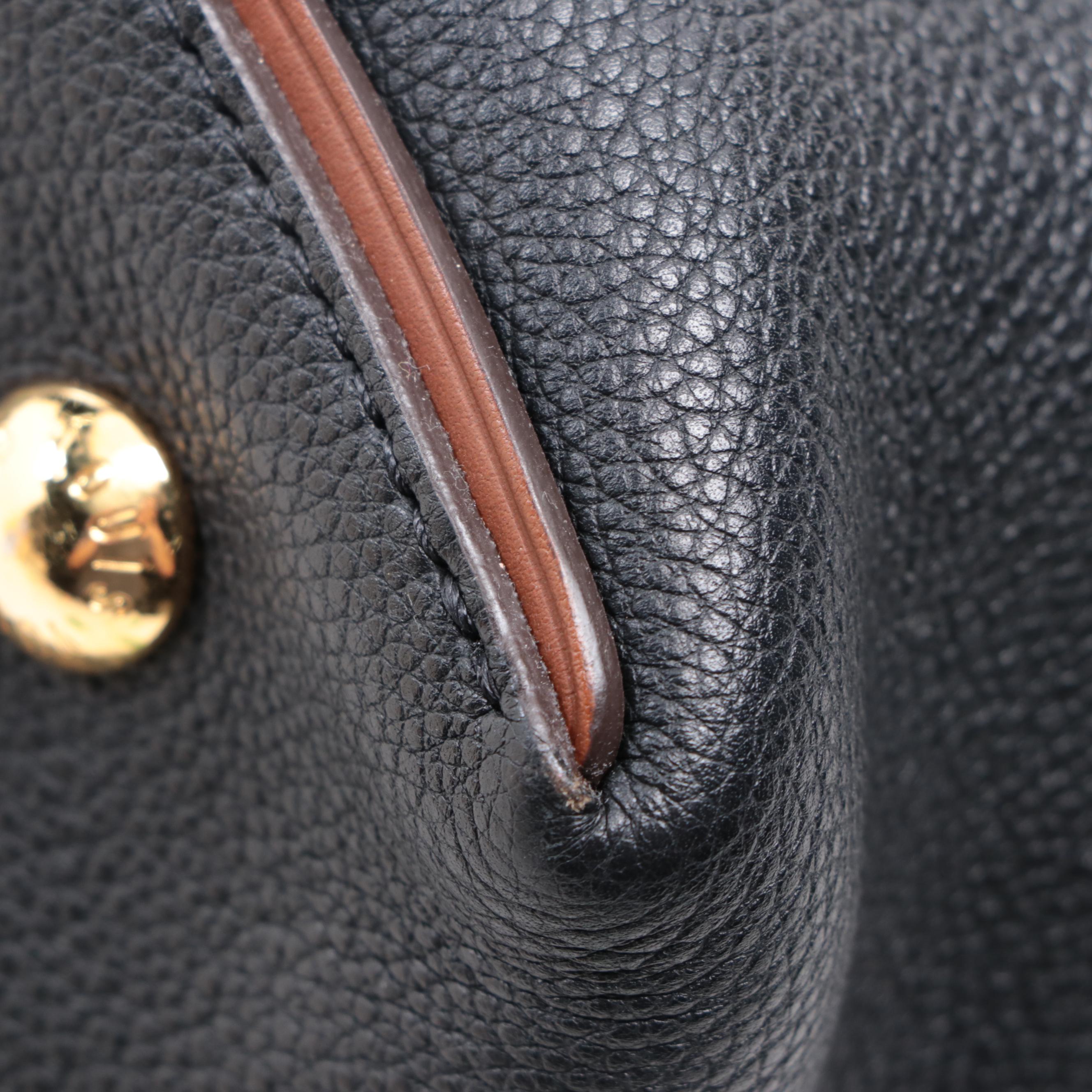 Louis Vuitton W PM Bag in Monogram Canvas and Bicolor Leather