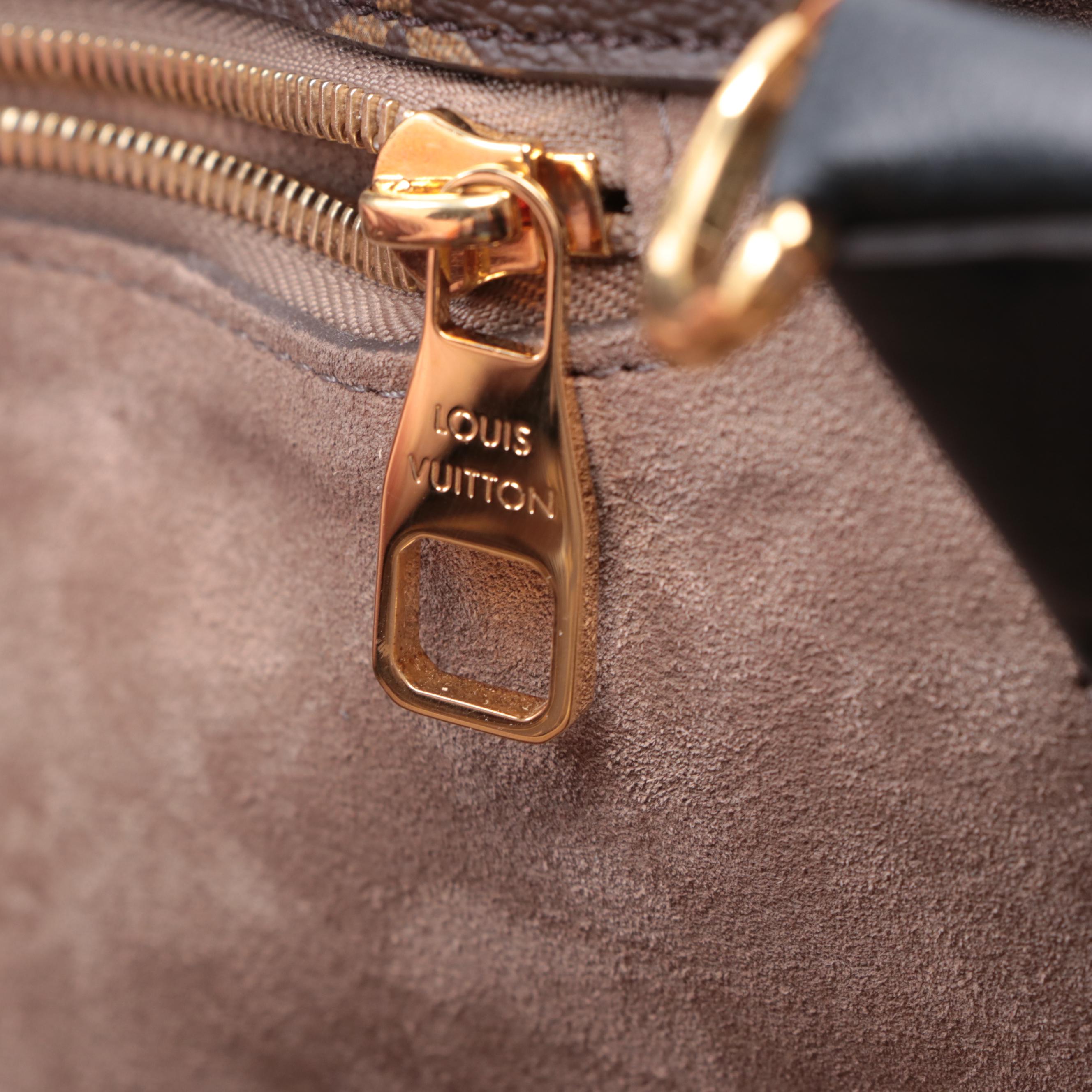 Louis Vuitton W PM Bag in Monogram Canvas and Bicolor Leather