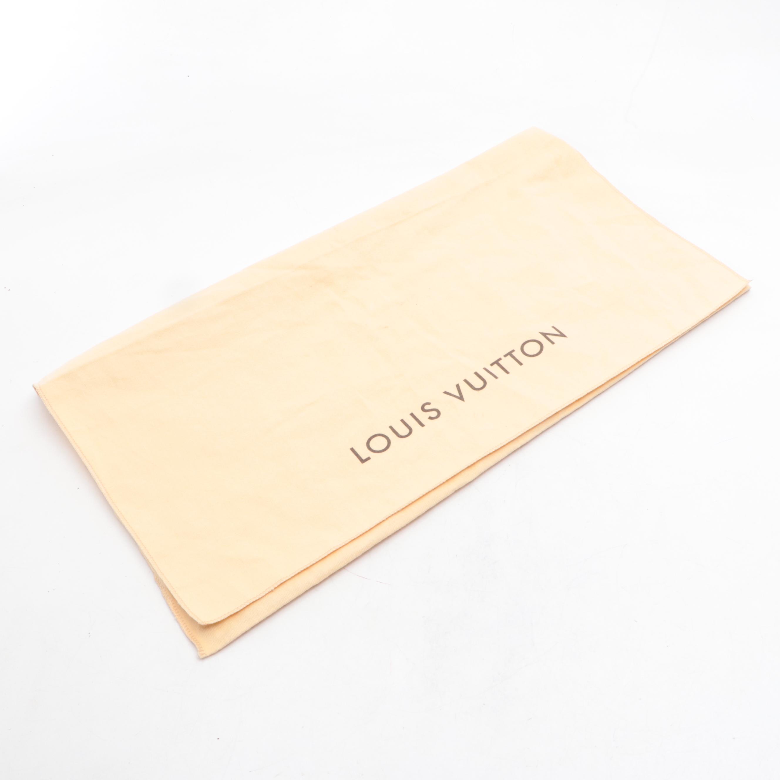 Louis Vuitton W PM Bag in Monogram Canvas and Bicolor Leather