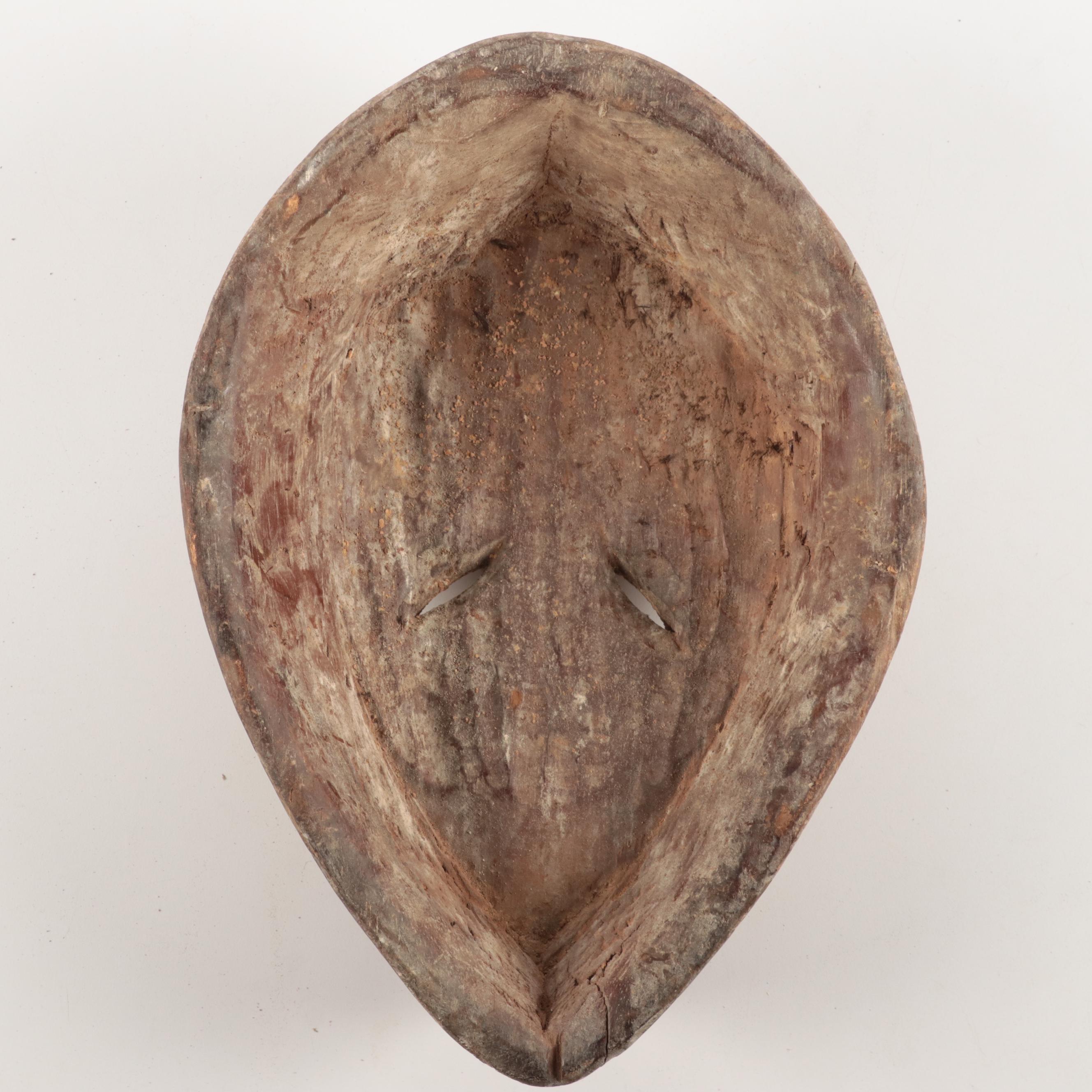 Lega and Igbo Style Carved Wooden Masks, Central Africa