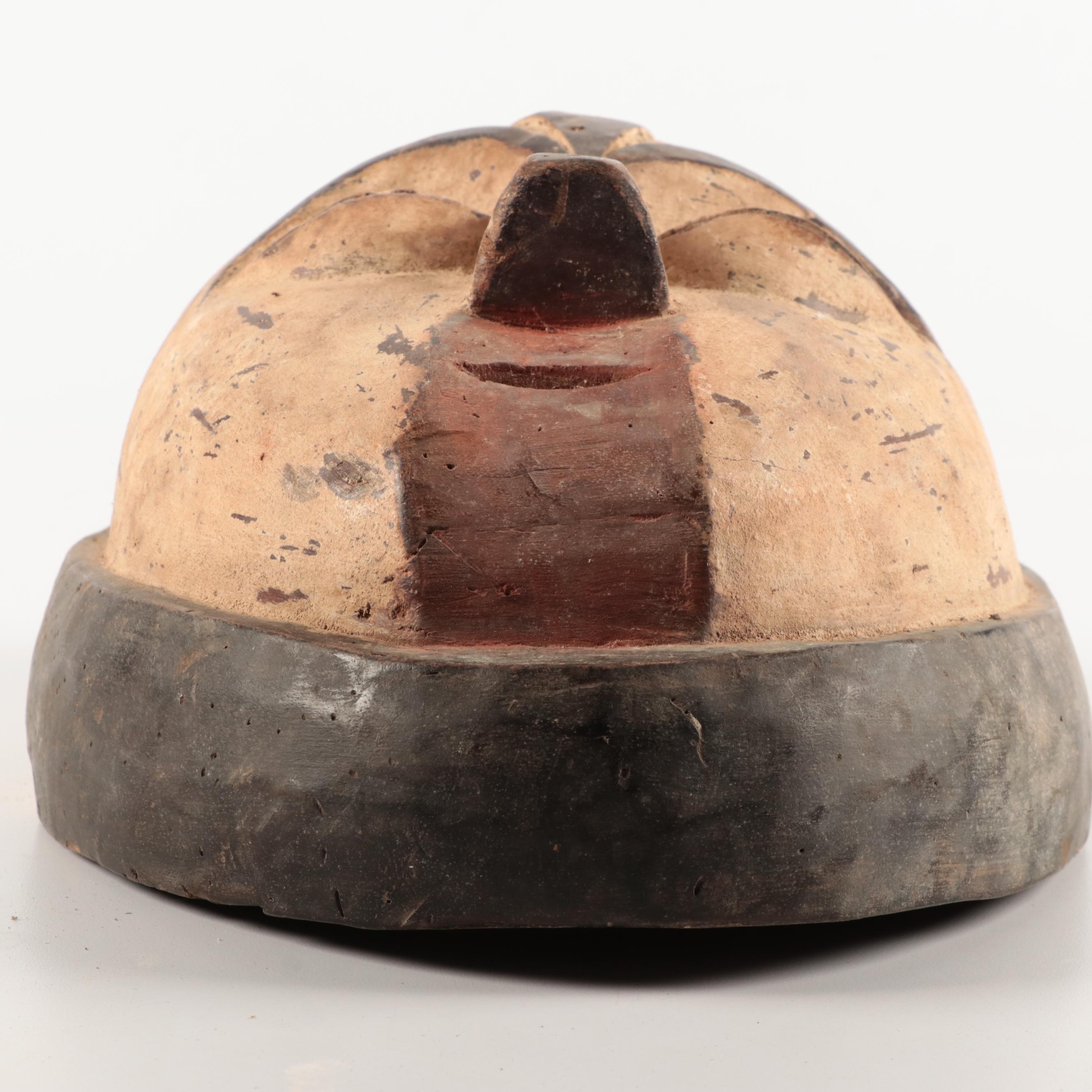 Lega and Igbo Style Carved Wooden Masks, Central Africa