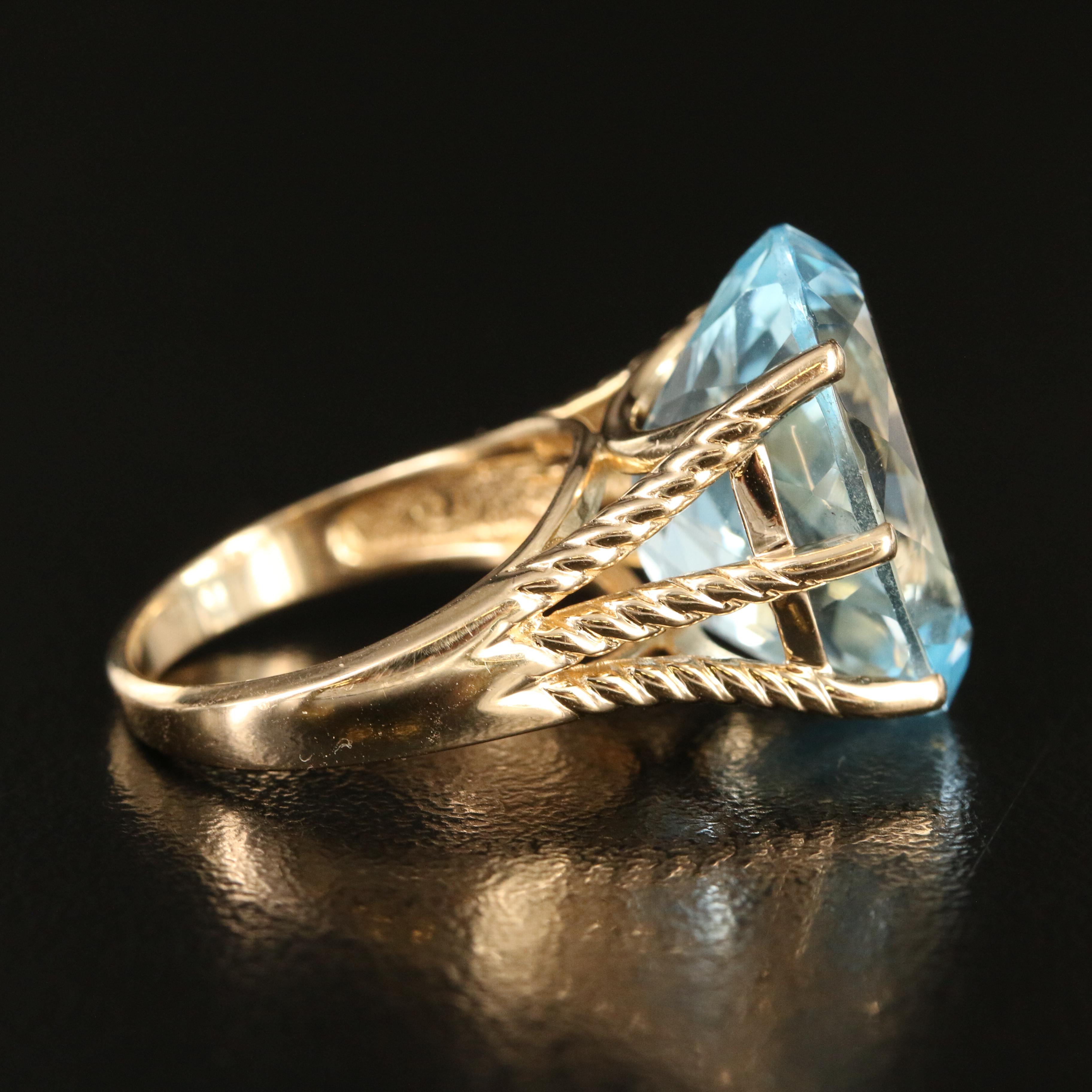 14K 19.08 CT Sky Blue Topaz Ring with Rope Details
