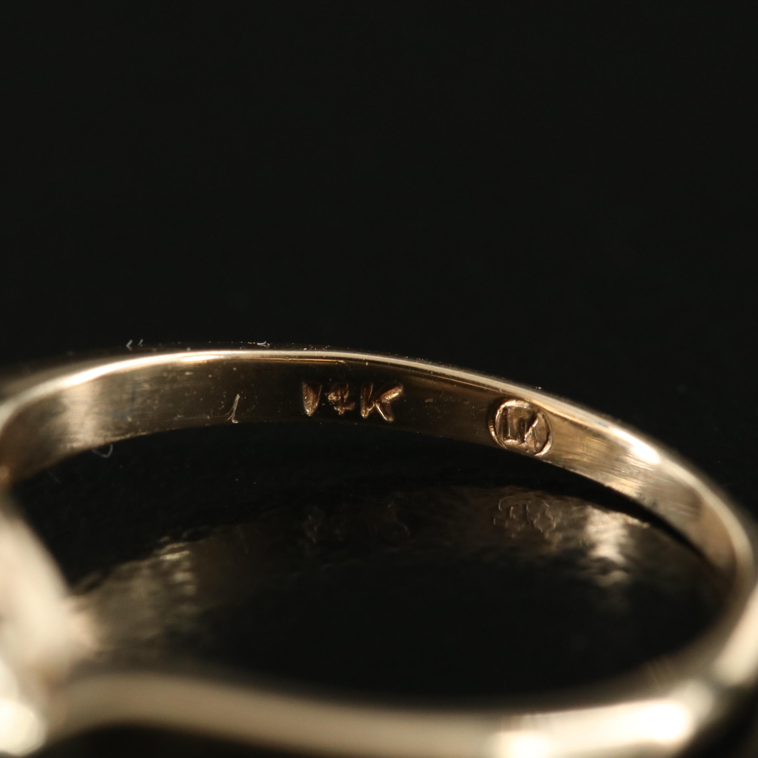 14K 0.15 CTW Diamond Oval Ring